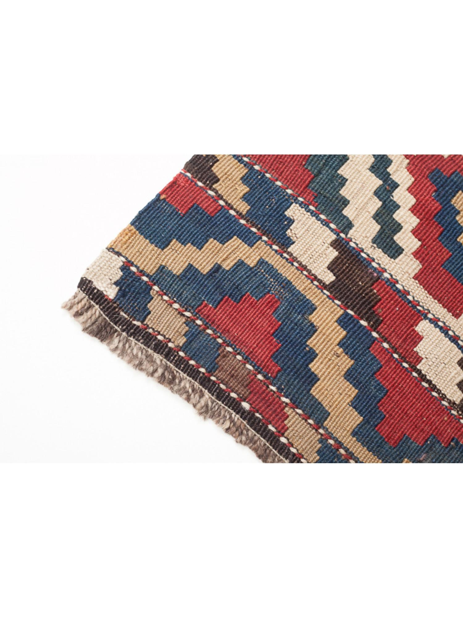 This is an antique collectible square early 20th century Kilim Woven Cradle Part from the Caucasus region with a rare and beautiful color composition.

Of the four countries that make up the Caucasus, Azerbaijan produces the most kilims, and the
