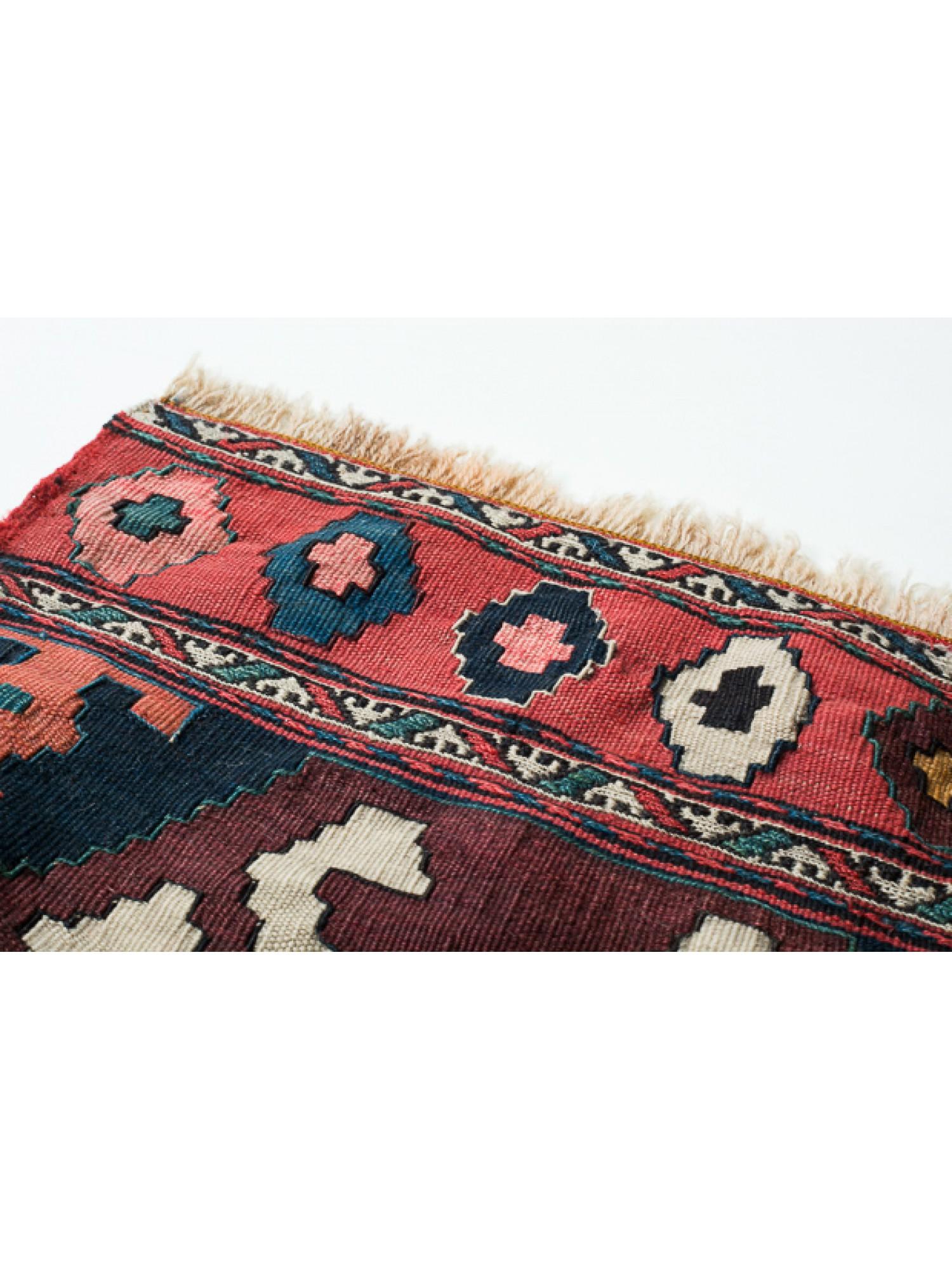 This is an antique collectible square early 20th century Kilim Woven Cradle Part from the Caucasus region with a rare and beautiful color composition.

Of the four countries that make up the Caucasus, Azerbaijan produces the most kilims, and the