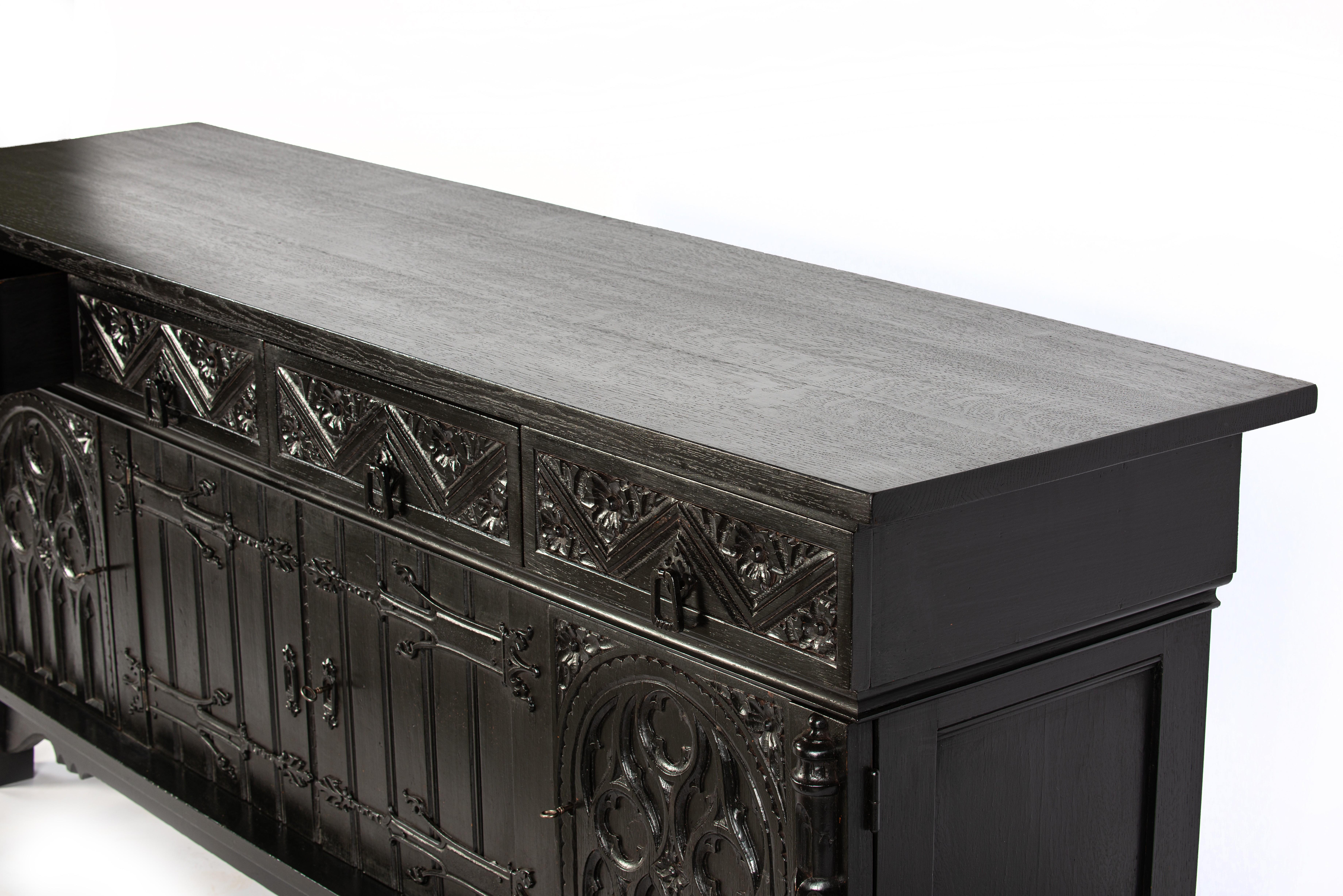 Antique early 20th century Dutch handcarved blackened oak neo gothic sideboard. For Sale 8