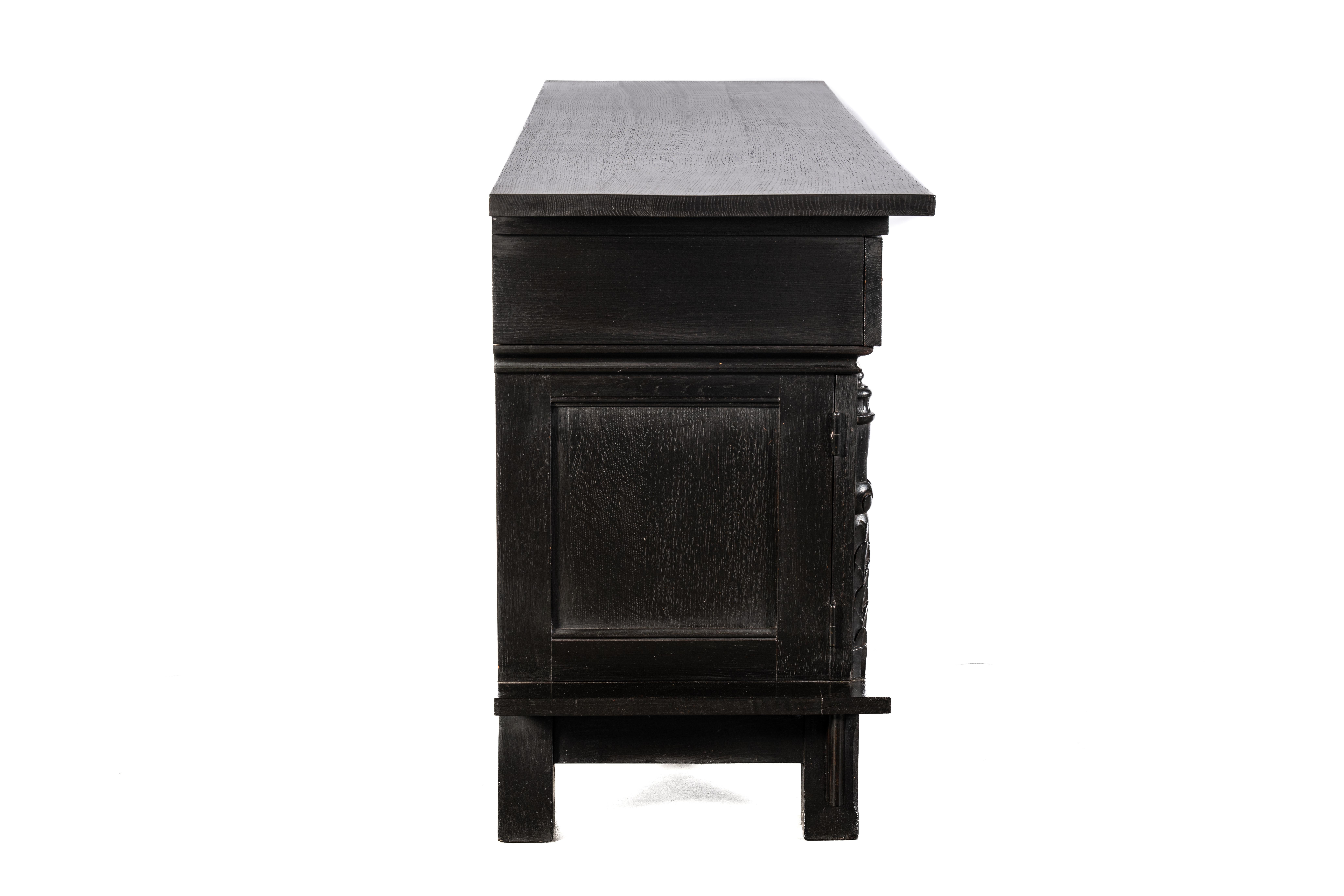 Gothic Revival Antique early 20th century Dutch handcarved blackened oak neo gothic sideboard. For Sale