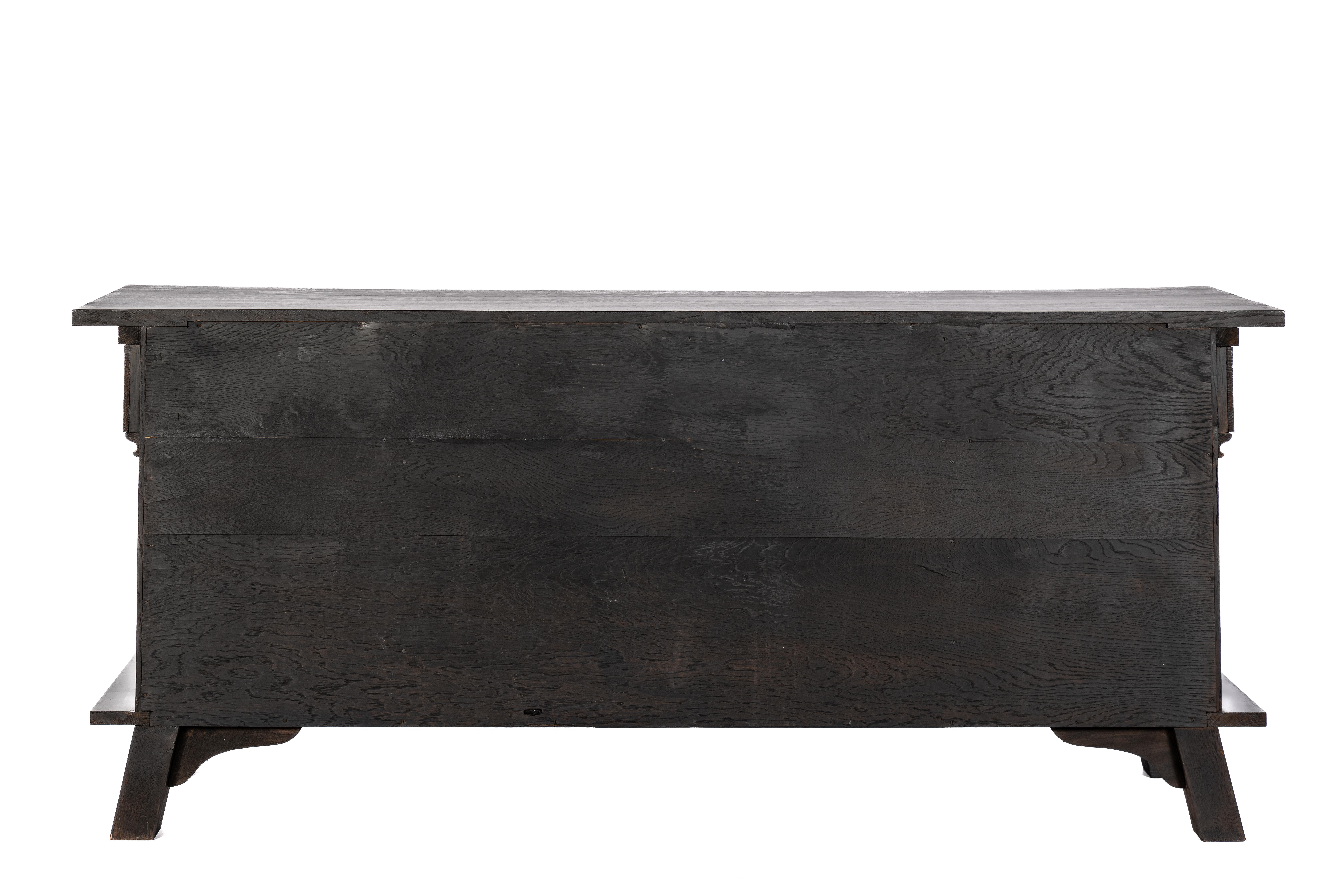 Antique early 20th century Dutch handcarved blackened oak neo gothic sideboard. In Good Condition For Sale In Casteren, NL