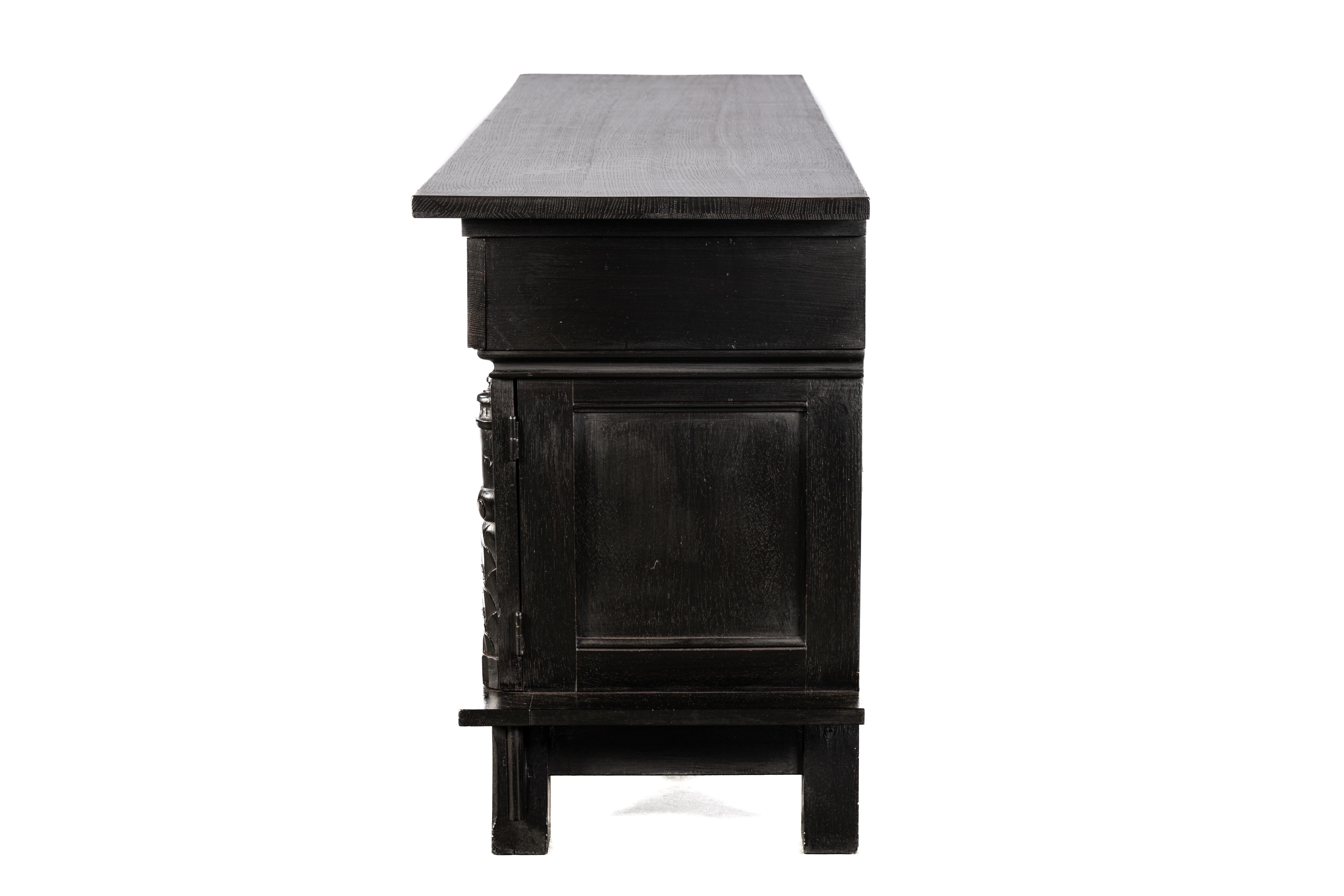 20th Century Antique early 20th century Dutch handcarved blackened oak neo gothic sideboard. For Sale