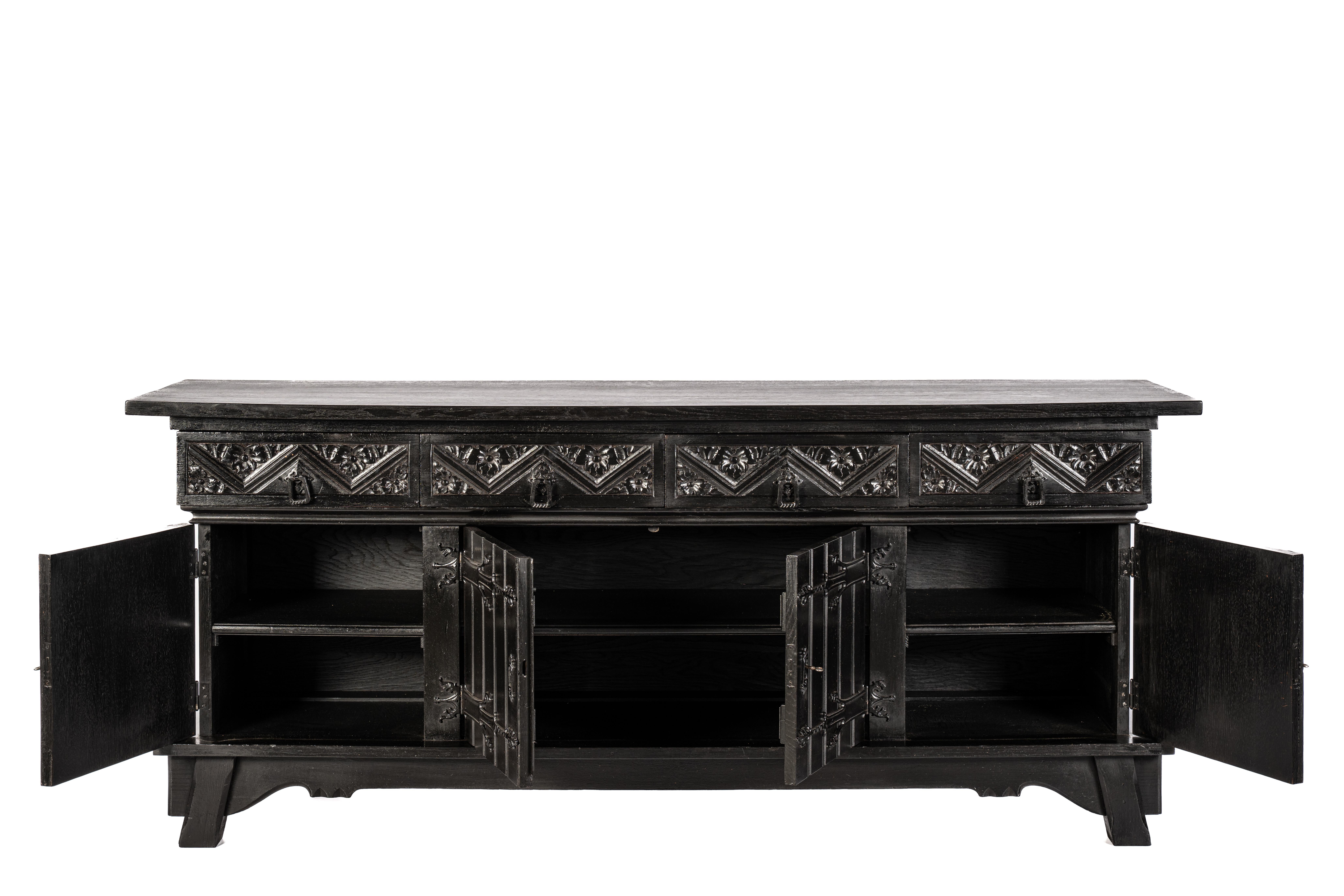 Oak Antique early 20th century Dutch handcarved blackened oak neo gothic sideboard. For Sale