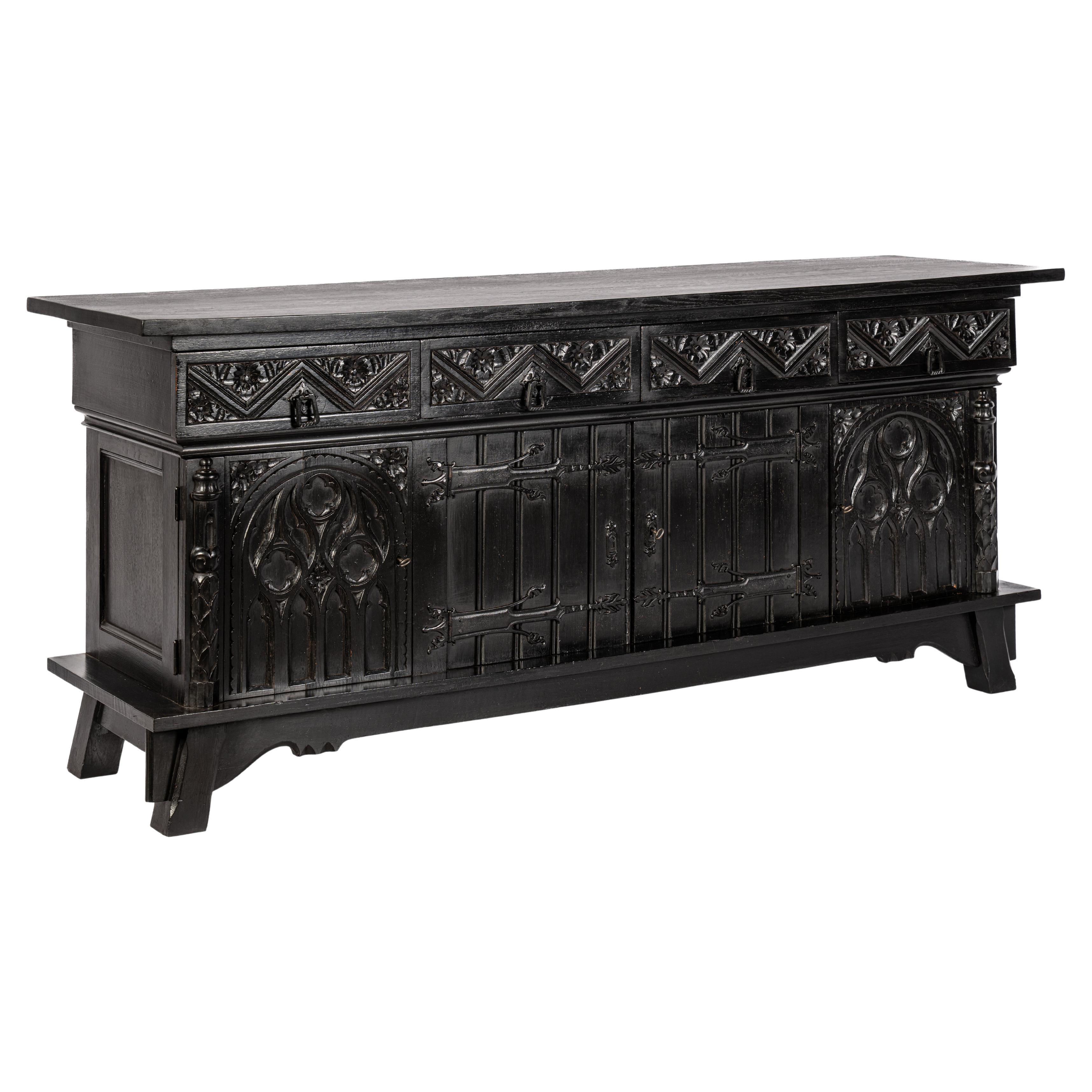 Antique early 20th century Dutch handcarved blackened oak neo gothic sideboard. For Sale