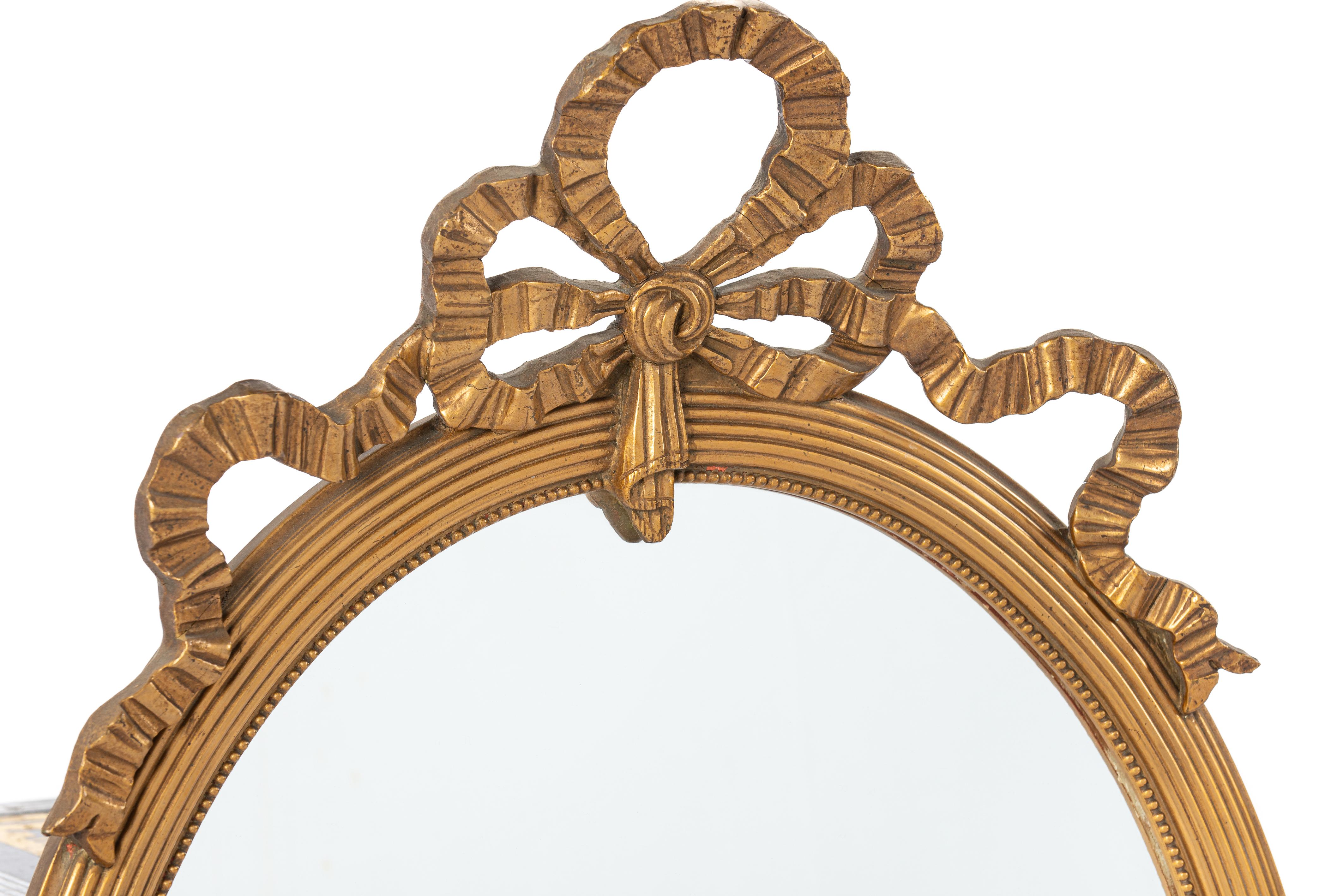 Gilt Antique early 20th-century French gold gilt Louis seize or Empire oval mirror  For Sale