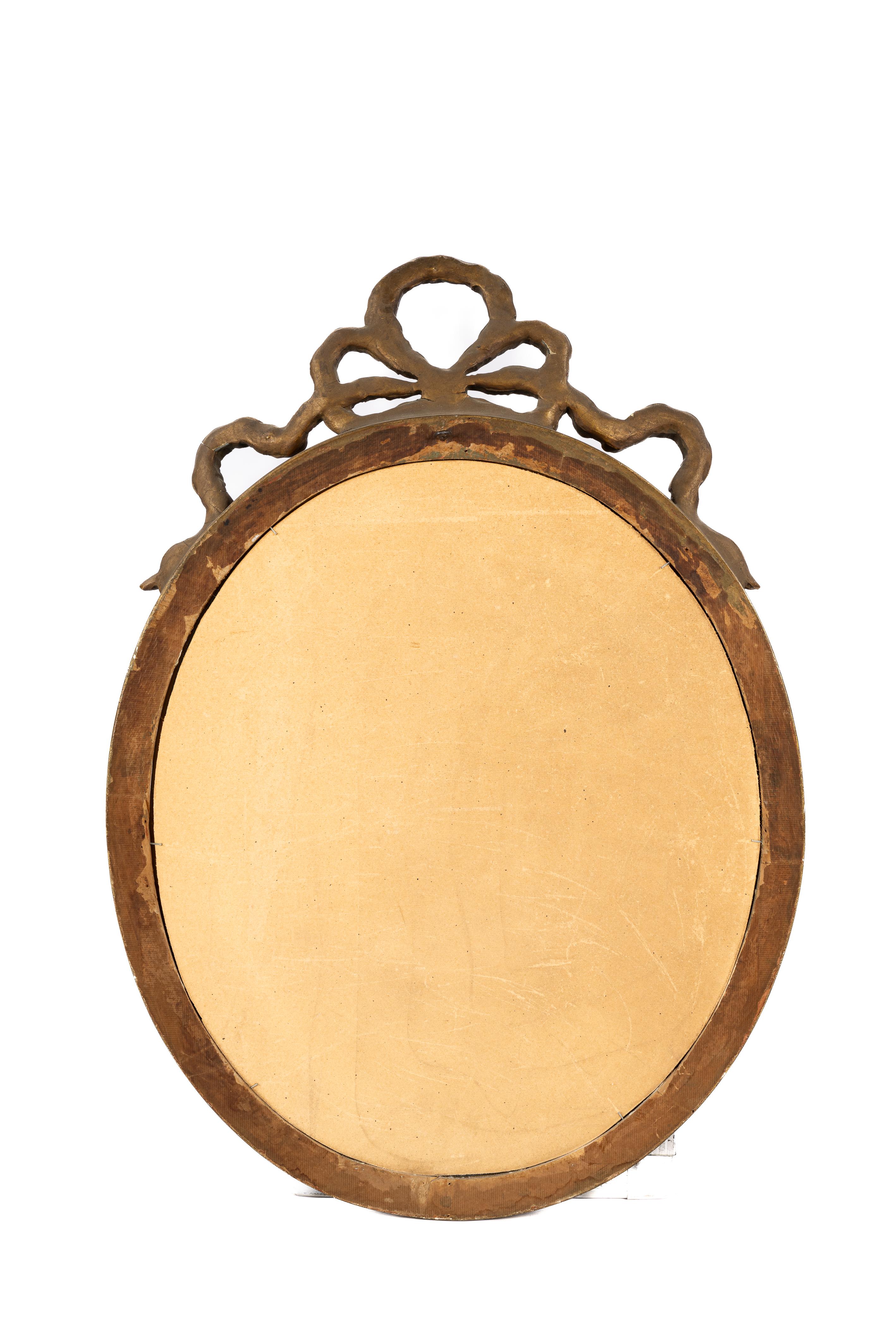 Antique early 20th-century French gold gilt Louis seize or Empire oval mirror  In Good Condition For Sale In Casteren, NL