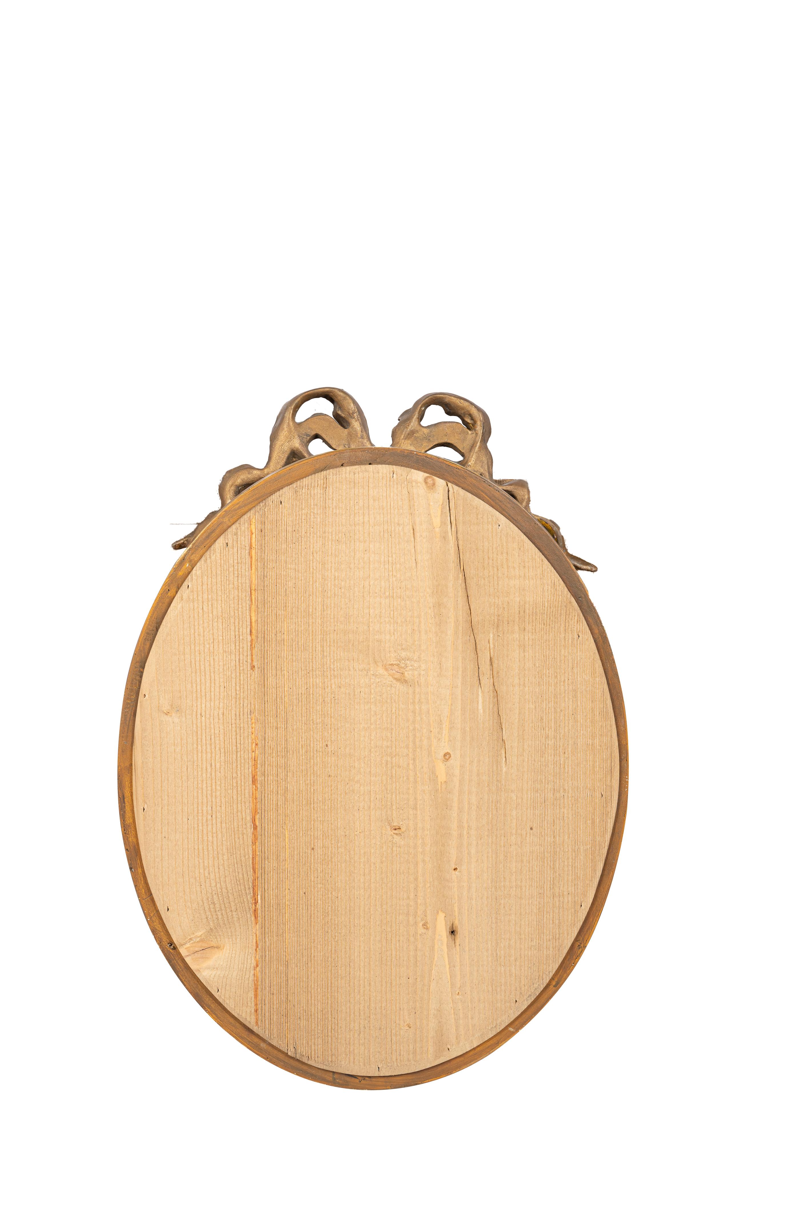 Gesso Antique début du 20e siècle, miroir à ruban ovale à nœuds en or doré français. en vente