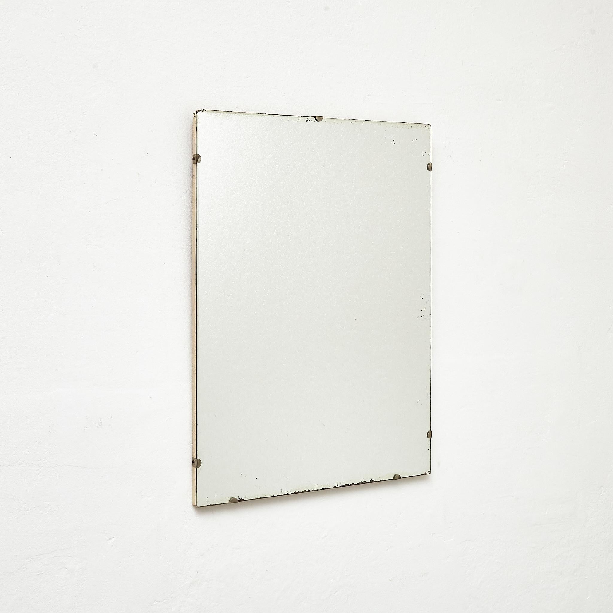 Antique Early 20th century French Wall Mirror.

Manufactured France, circa 1940.

Materials:
Wood, mirror

Dimensions: 
D 2 x W 45 cm x H 60 cm

In original condition, with minor wear consistent with age and use, preserving a beautiful