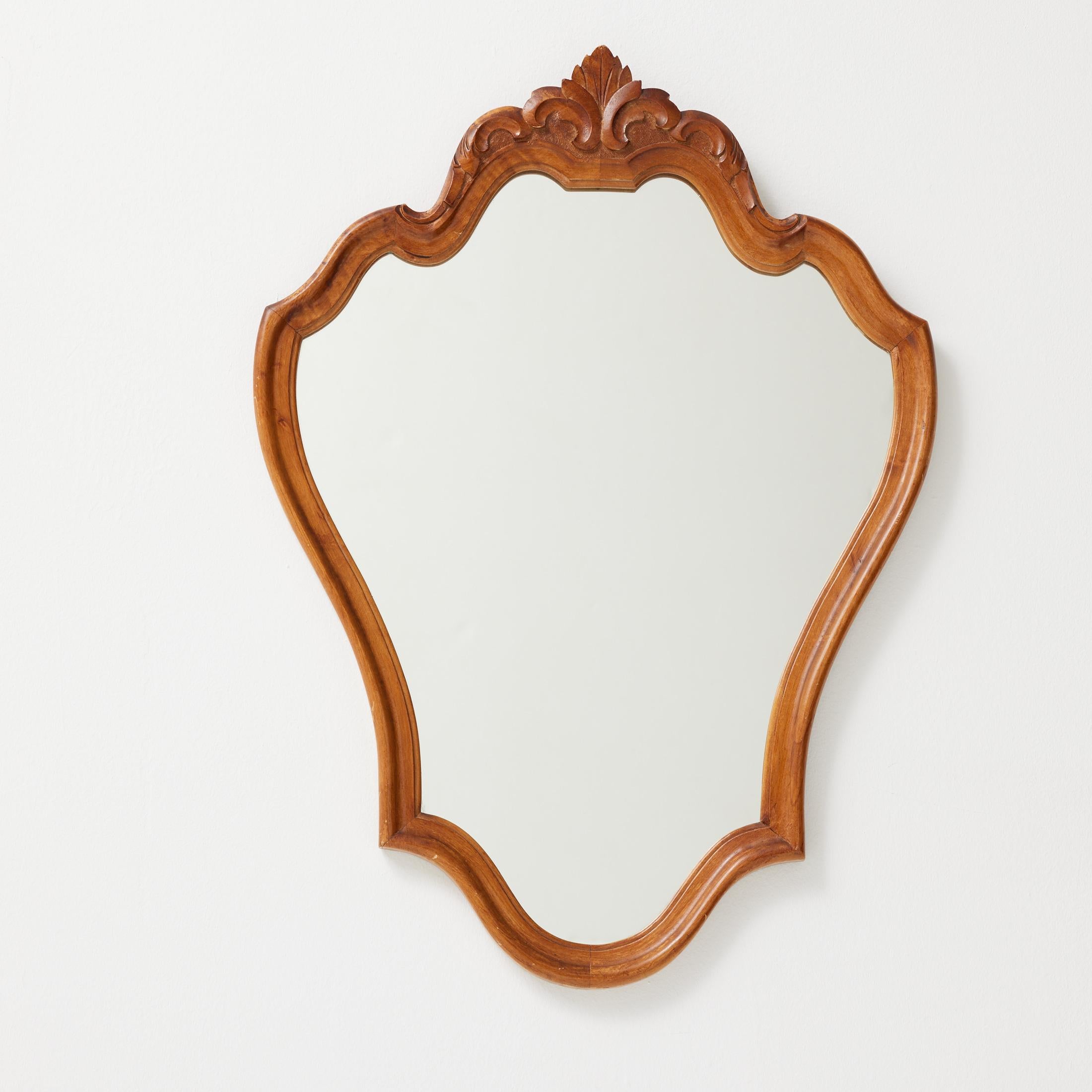 Antique Early 20th century French Wood  Mirror.

Manufactured France, circa 1940.

Materials:
Wood, mirror

In original condition, with minor wear consistent with age and use, preserving a beautiful patina.

Important information regarding color(s)