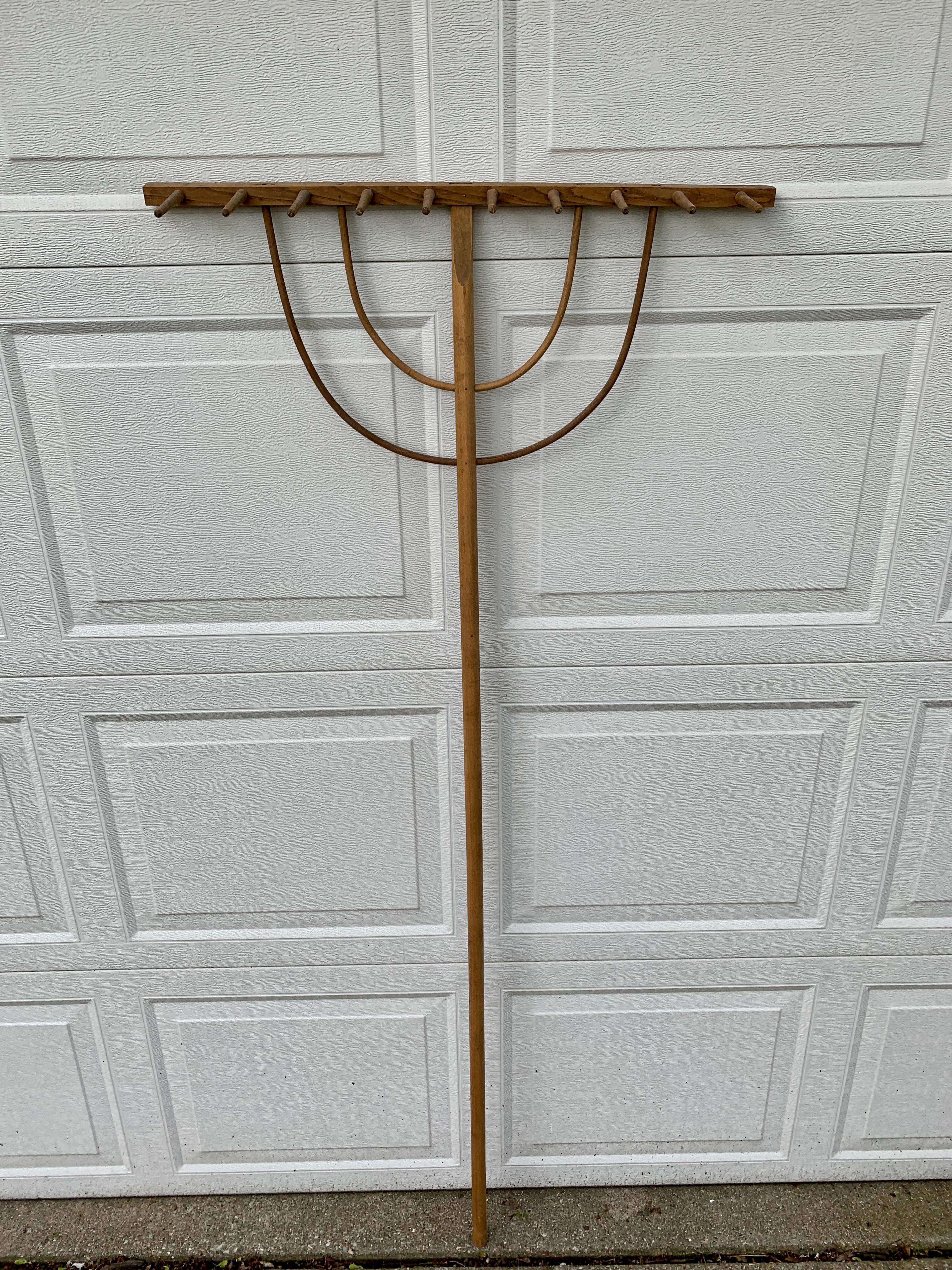 A beautiful antique rustic, farmhouse, or country wooden handmade hay rake. This would be ideal for an installation on a large wall on a custom wall mount. 

USA, circa late 19th century

Measures: 27