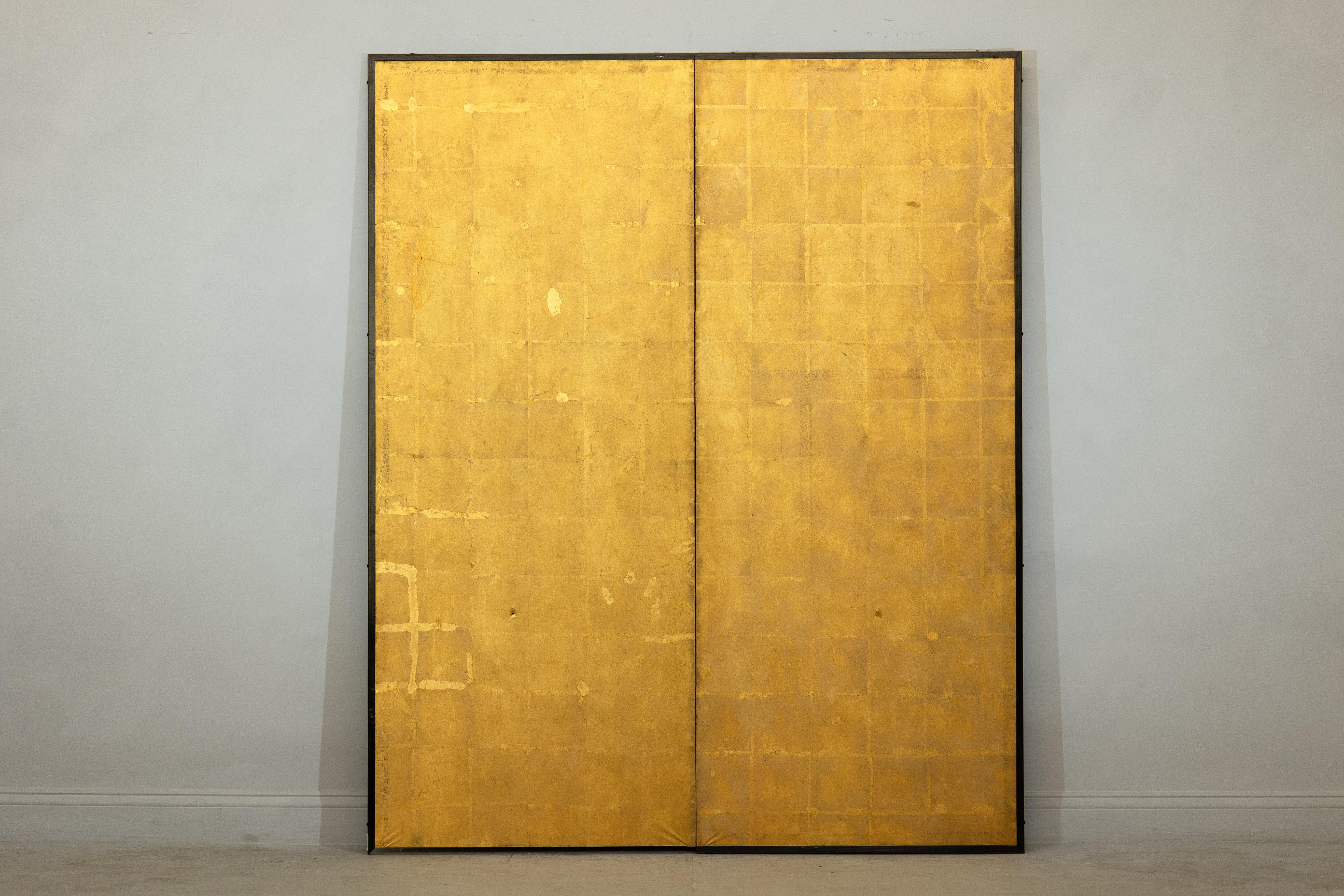 This elegant two-panel byōbu screen likely dates to the early 20th century and embodies the timeless refinement of Japanese folding screens. Each panel is constructed on a lightweight wooden lattice frame and covered with overlapping sheets of washi