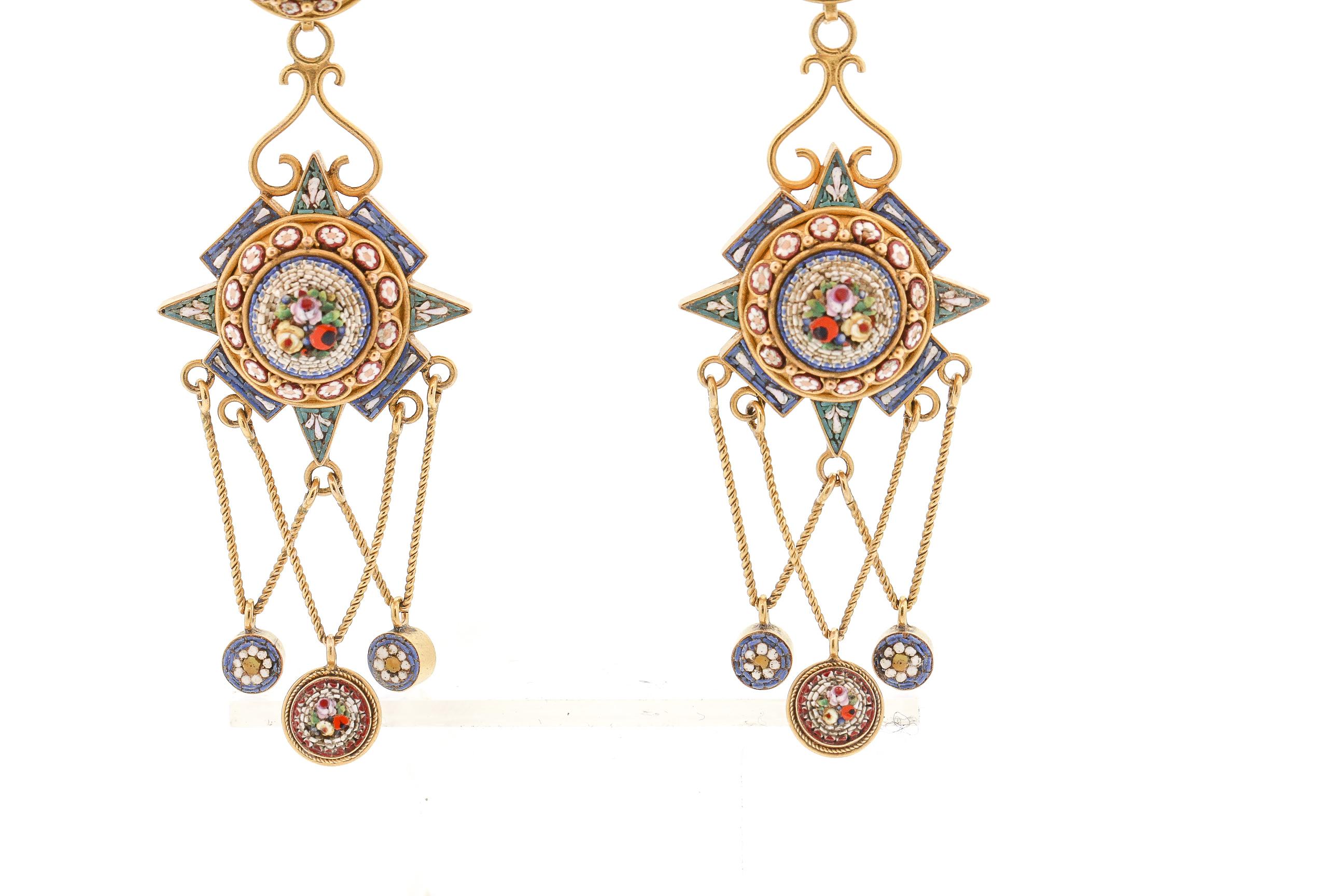 Detailed antique micromosaic pendant earrings made in 14k carat gold circa 1900. These earrings have beautiful length and movement. Very modern feeling for such an antique earring. The blue, red and white micro mosaic is set to depict colored
