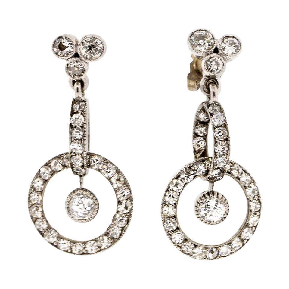 A pair of early 20th century diamond-set hoop drop earrings For Sale at ...