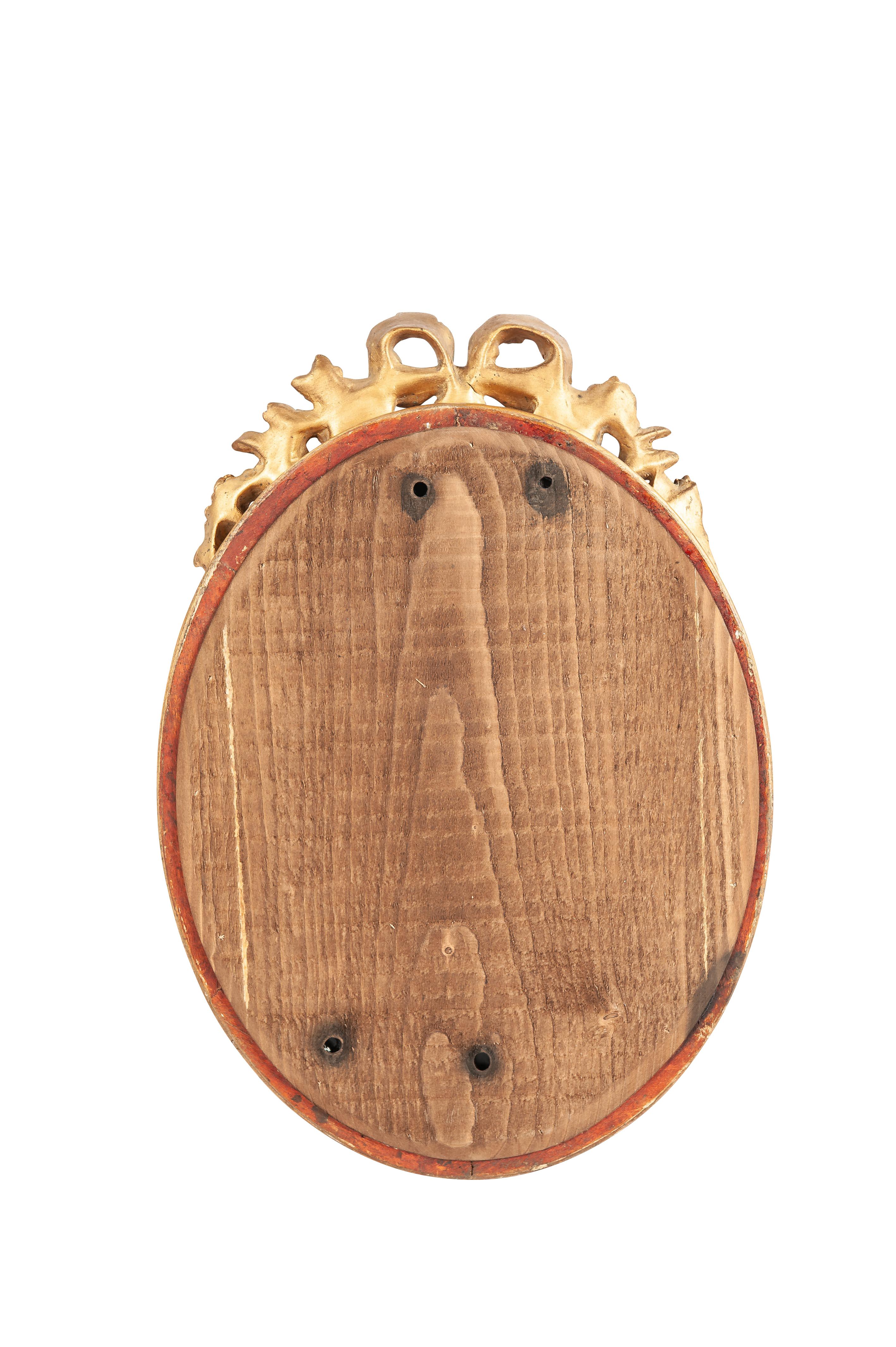 Français Antique début 20ème siècle petit miroir ovale français doré à la feuille d'or et à la peinture  en vente