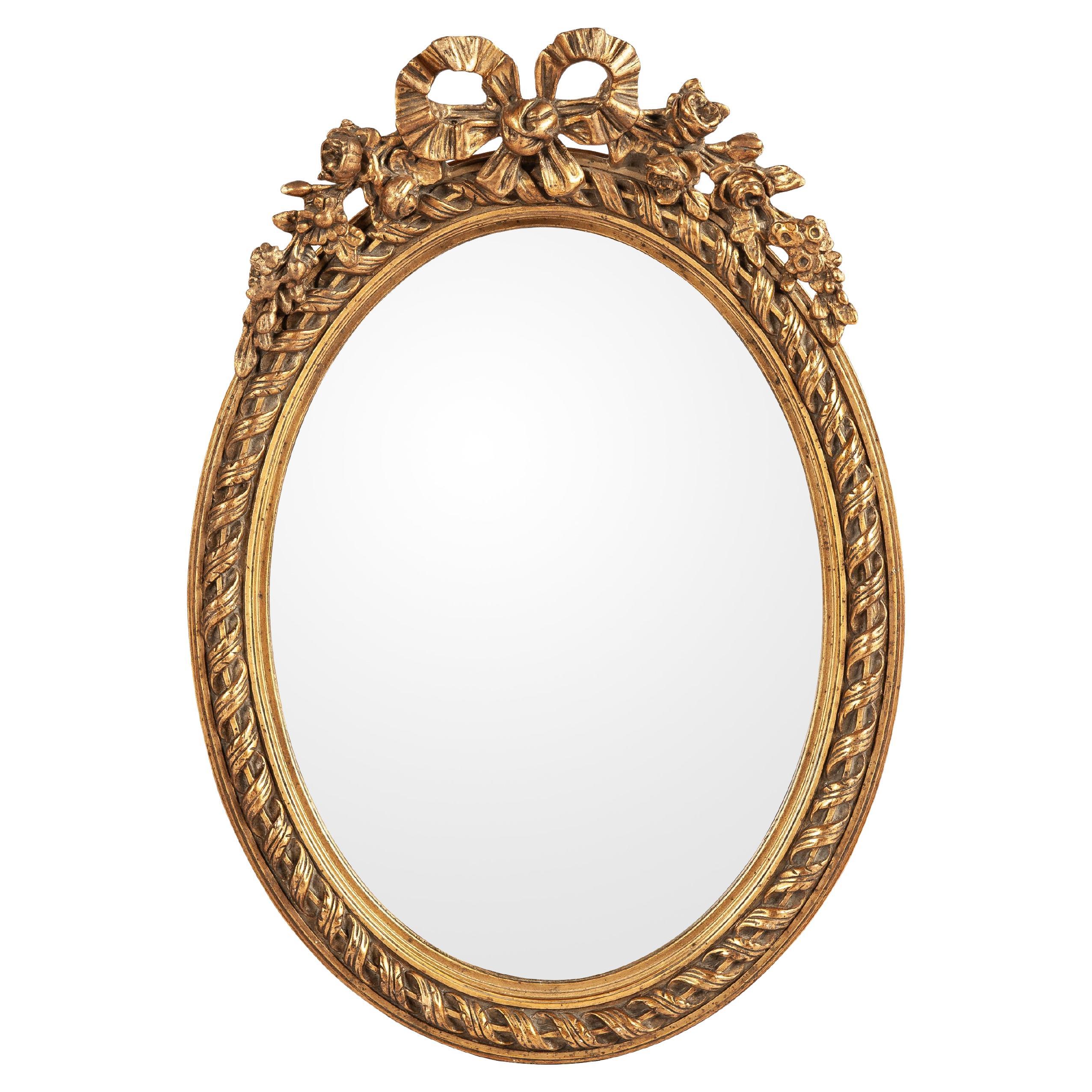 Antique début 20ème siècle petit miroir ovale français doré à la feuille d'or et à la peinture  en vente