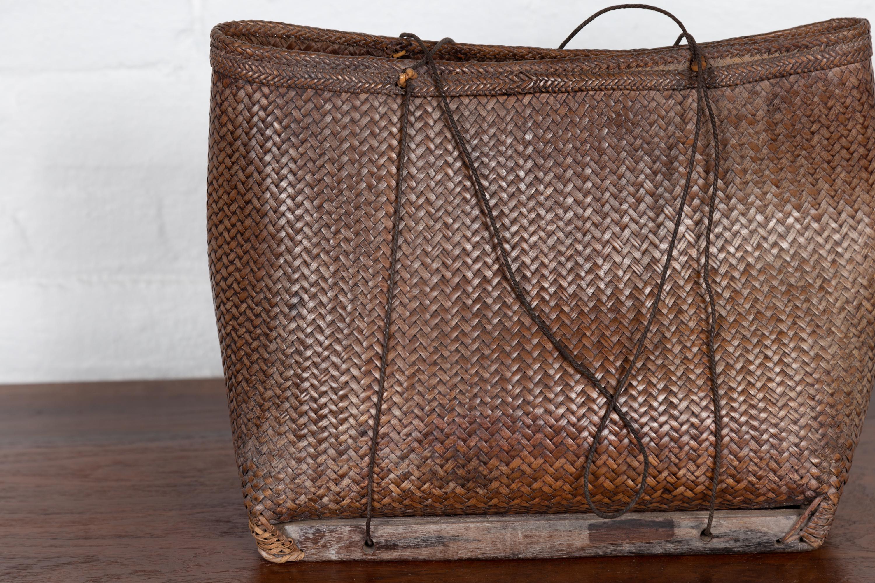 Rustic Antique Early 20th Century Small Woven Grain Basket from the Philippines