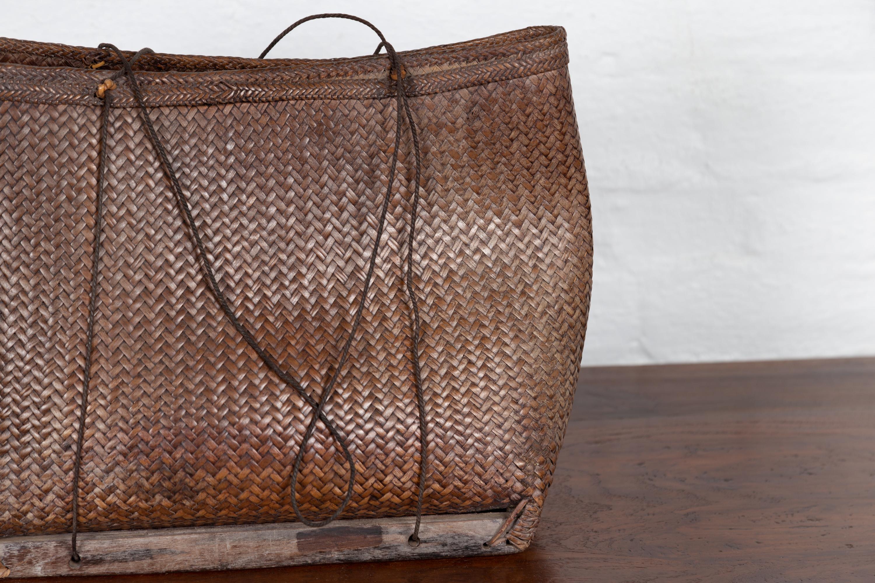 Antique Early 20th Century Small Woven Grain Basket from the Philippines In Good Condition In Yonkers, NY