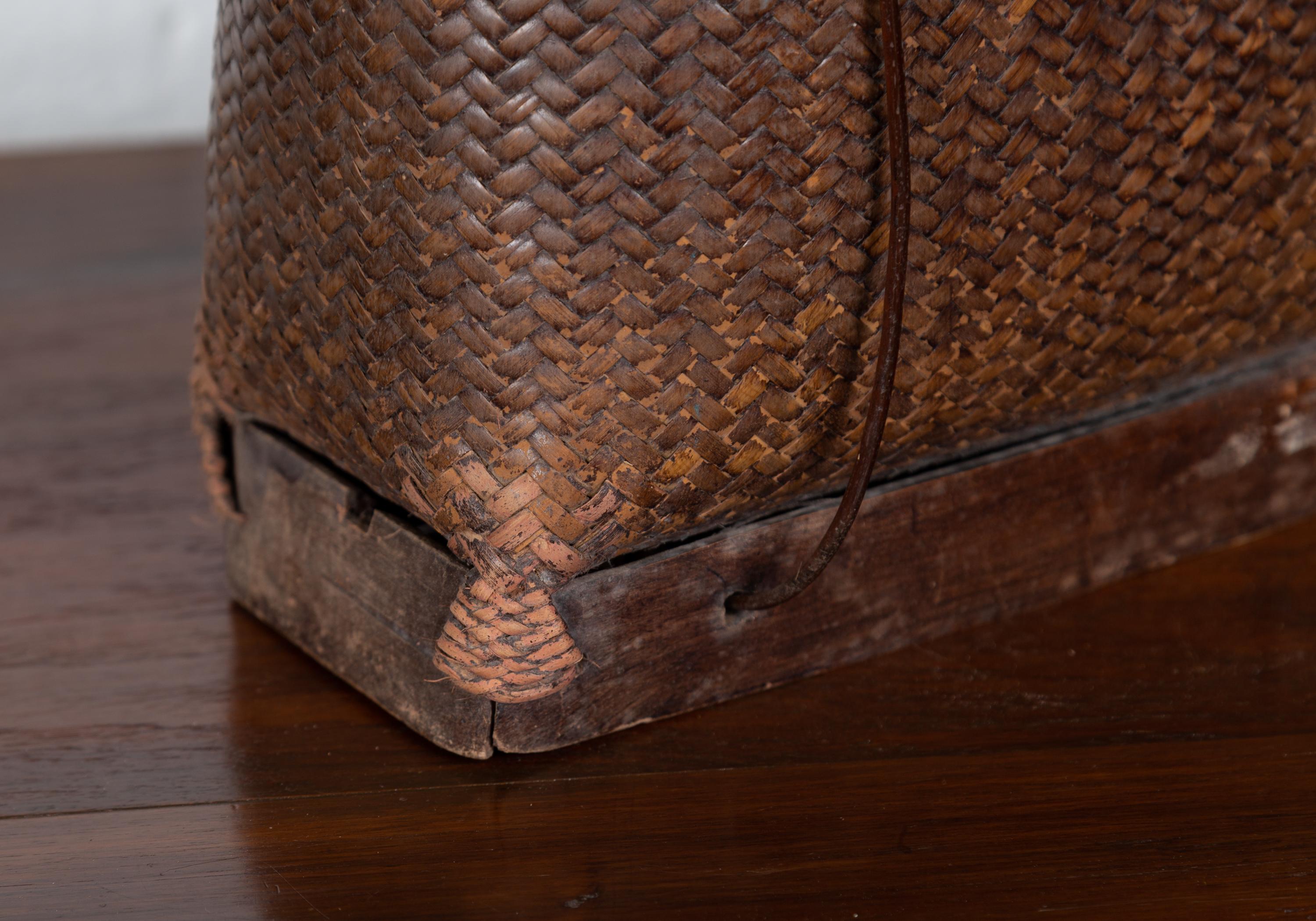 Small Rustic Hand-Woven Rattan Grain Basket from the Philippines In Fair Condition In Yonkers, NY