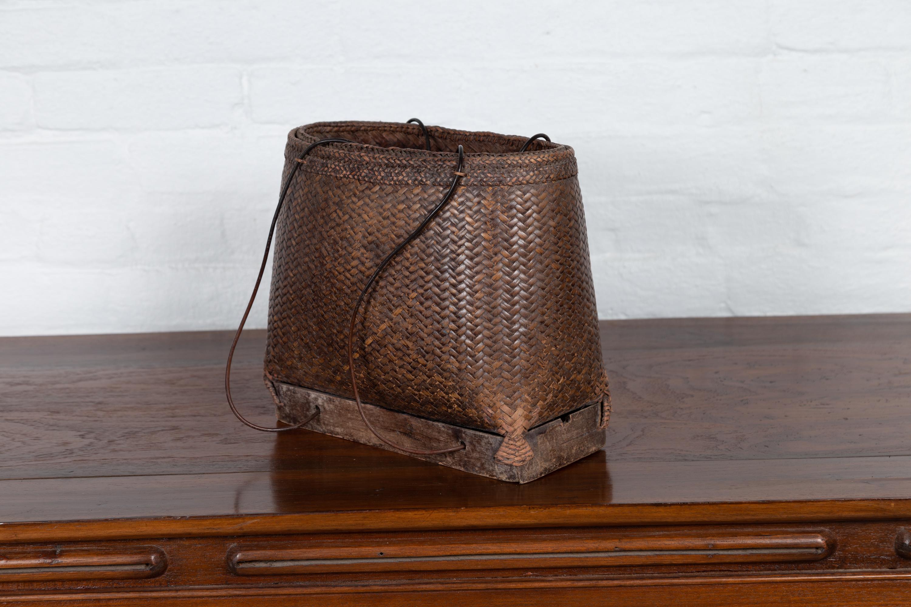 Antique Early 20th Century Small Woven Grain Basket from the Philippines In Fair Condition For Sale In Yonkers, NY