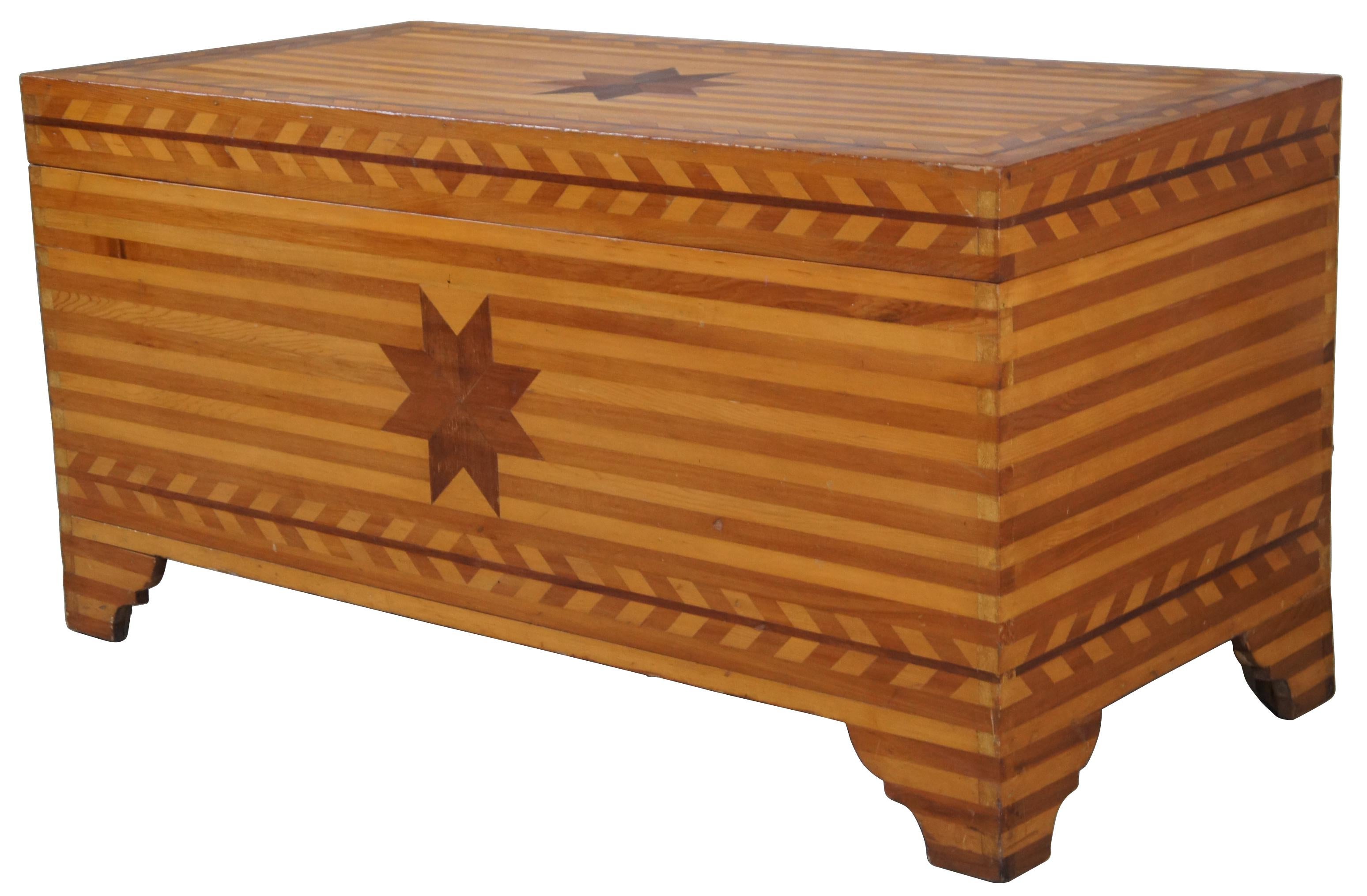 Antique Early American pine Folk Art farmhouse dowry or blanket chest featuring striped geometric parquetry design with lone stars. Acquired in the 1980’s from a Salt Lake City estate, retaining its original tags from Railway Express Agency,