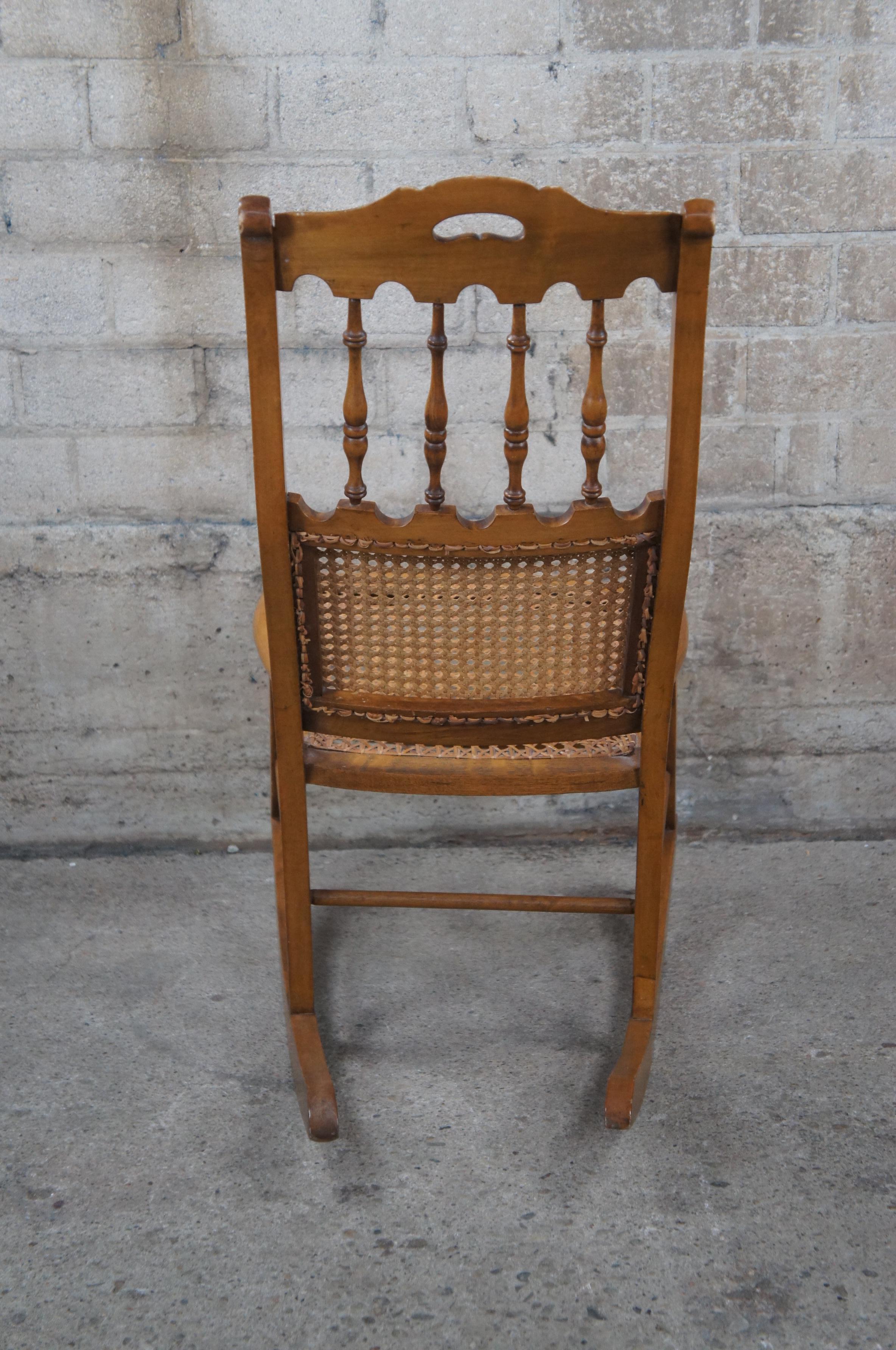American Colonial Antique Early American Maple Spindle Back Rocking Chair Cane Seat Petite Rocker For Sale