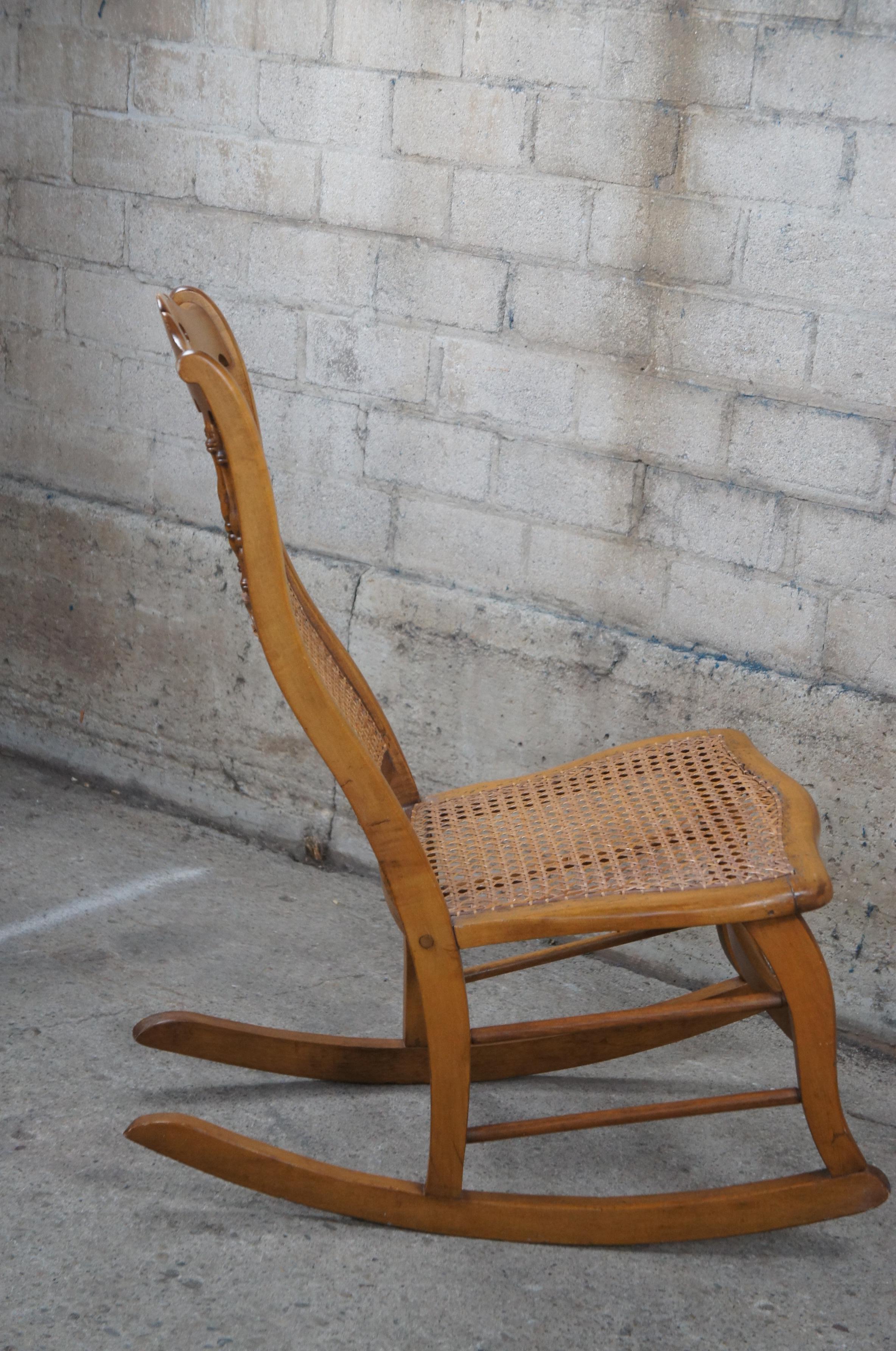 20th Century Antique Early American Maple Spindle Back Rocking Chair Cane Seat Petite Rocker For Sale