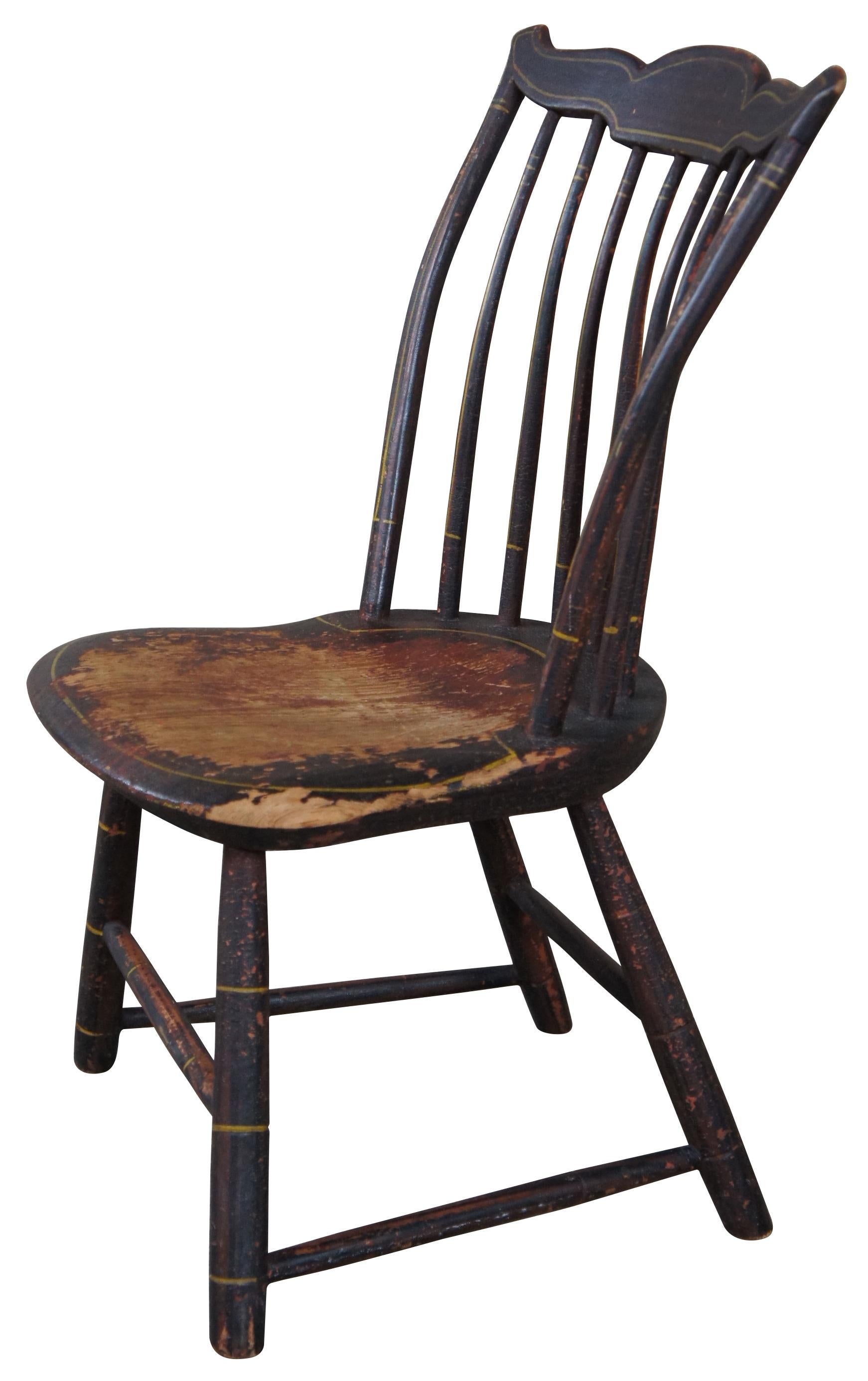 Antique New England Windsor step down chair in its original finish with gold painted trim. Crica first half 19th century.
 