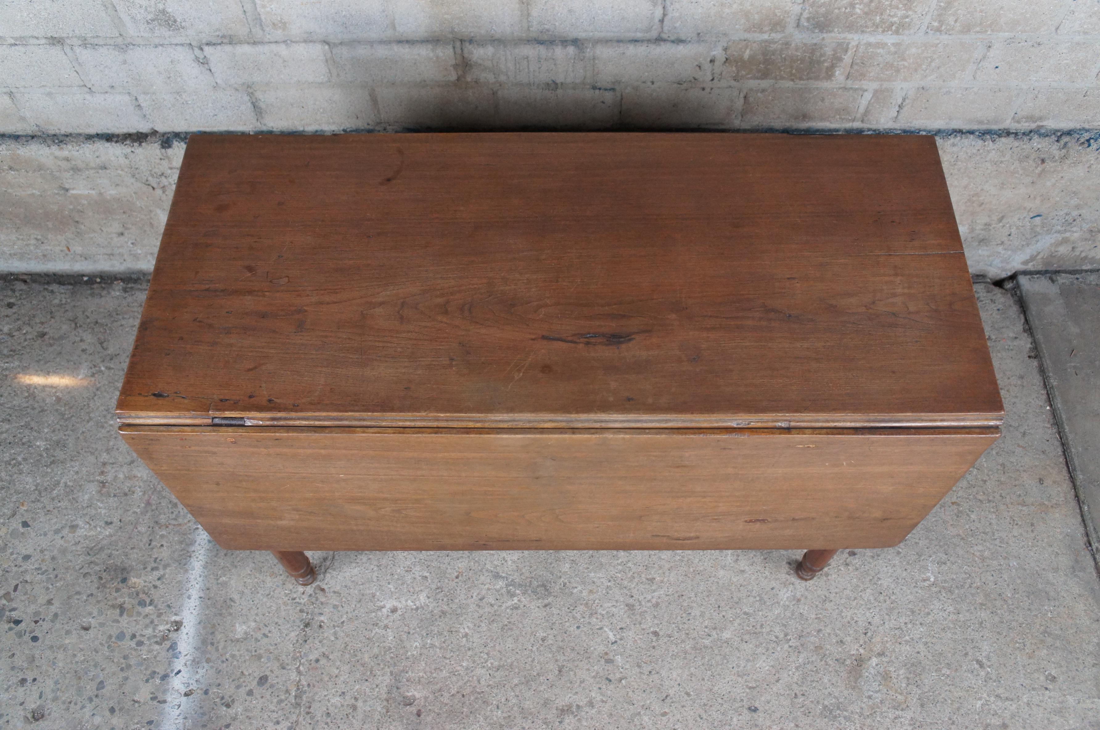 antique drop leaf dining table