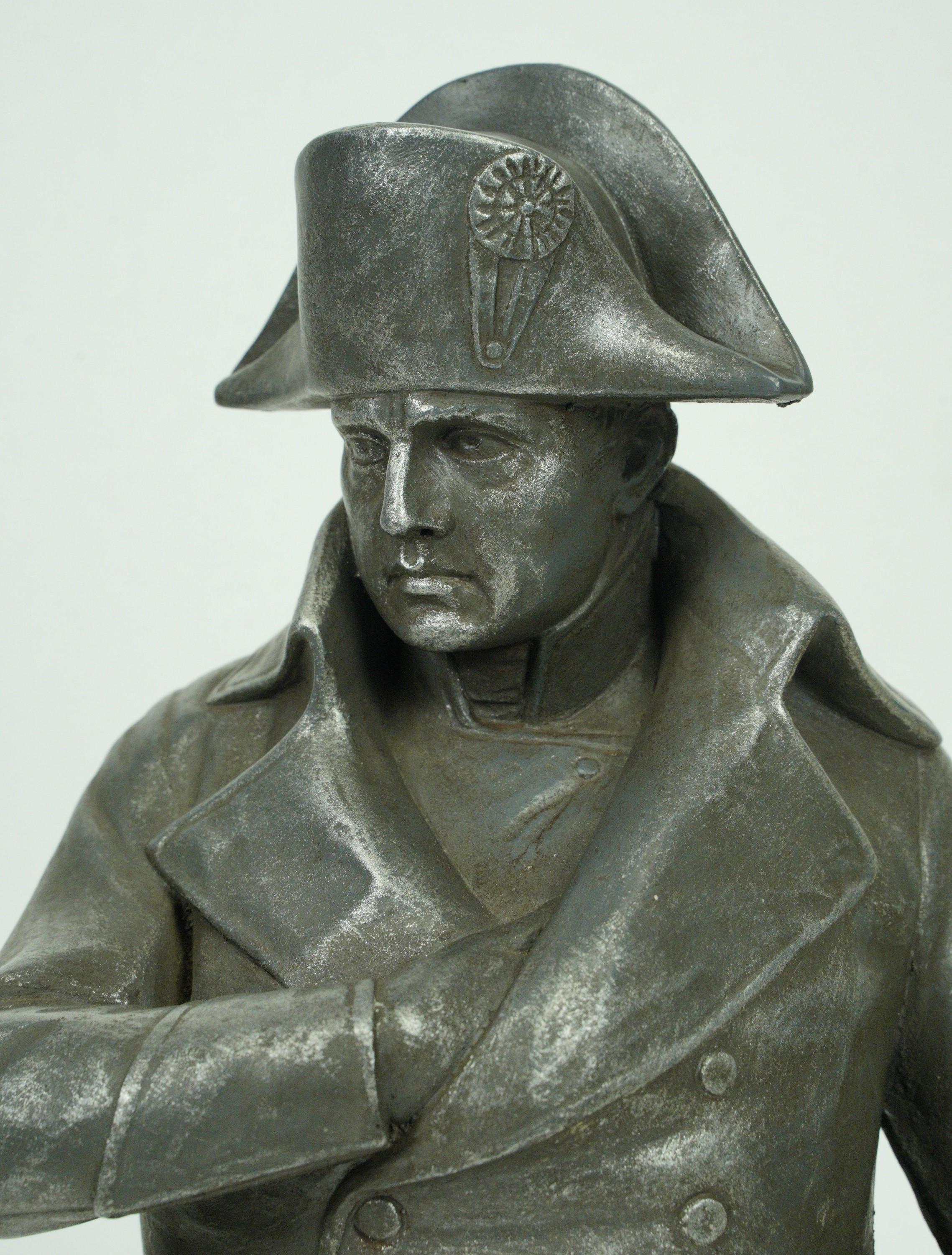 Figural statue of Napoleon Bonaparte made of solid aluminum. Good condition with appropriate wear from age. One available. Please note, this item is located in one of our NYC locations.