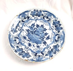 Antique Early Delftware Charger with Stylized Floral Decoration