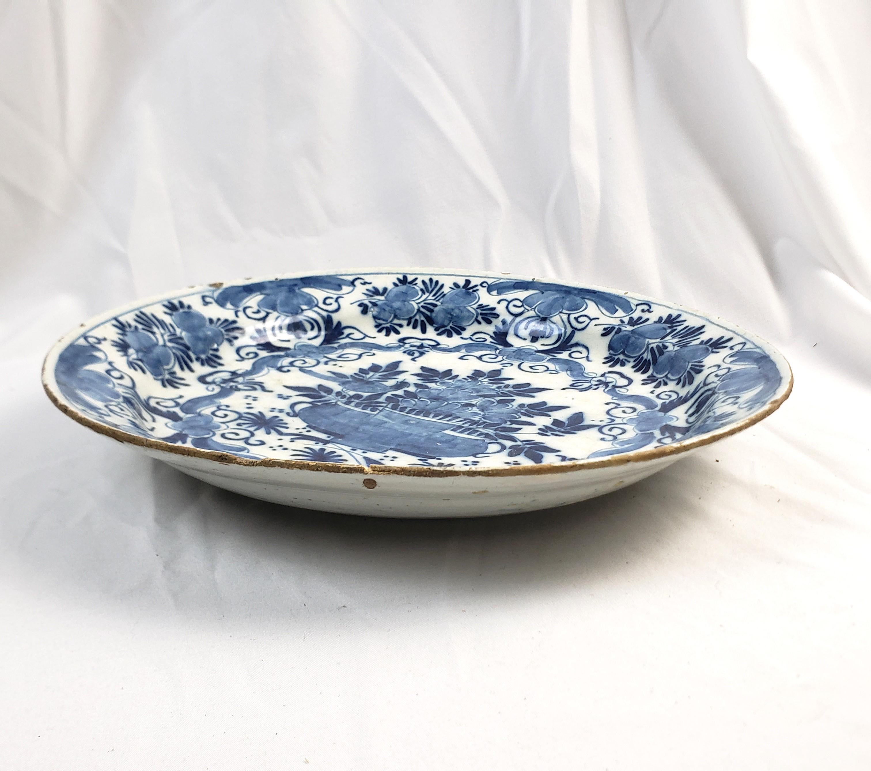Dutch Antique Early Delftware Charger with Stylized Floral Decoration For Sale
