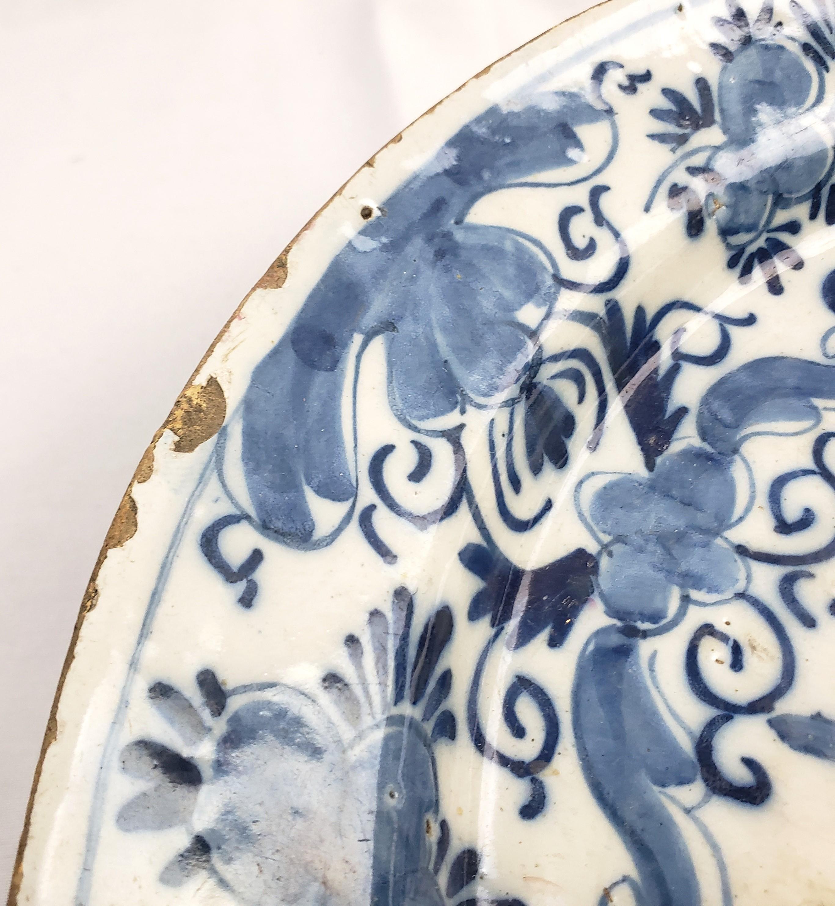 Antique Early Delftware Charger with Stylized Floral Decoration For Sale 1