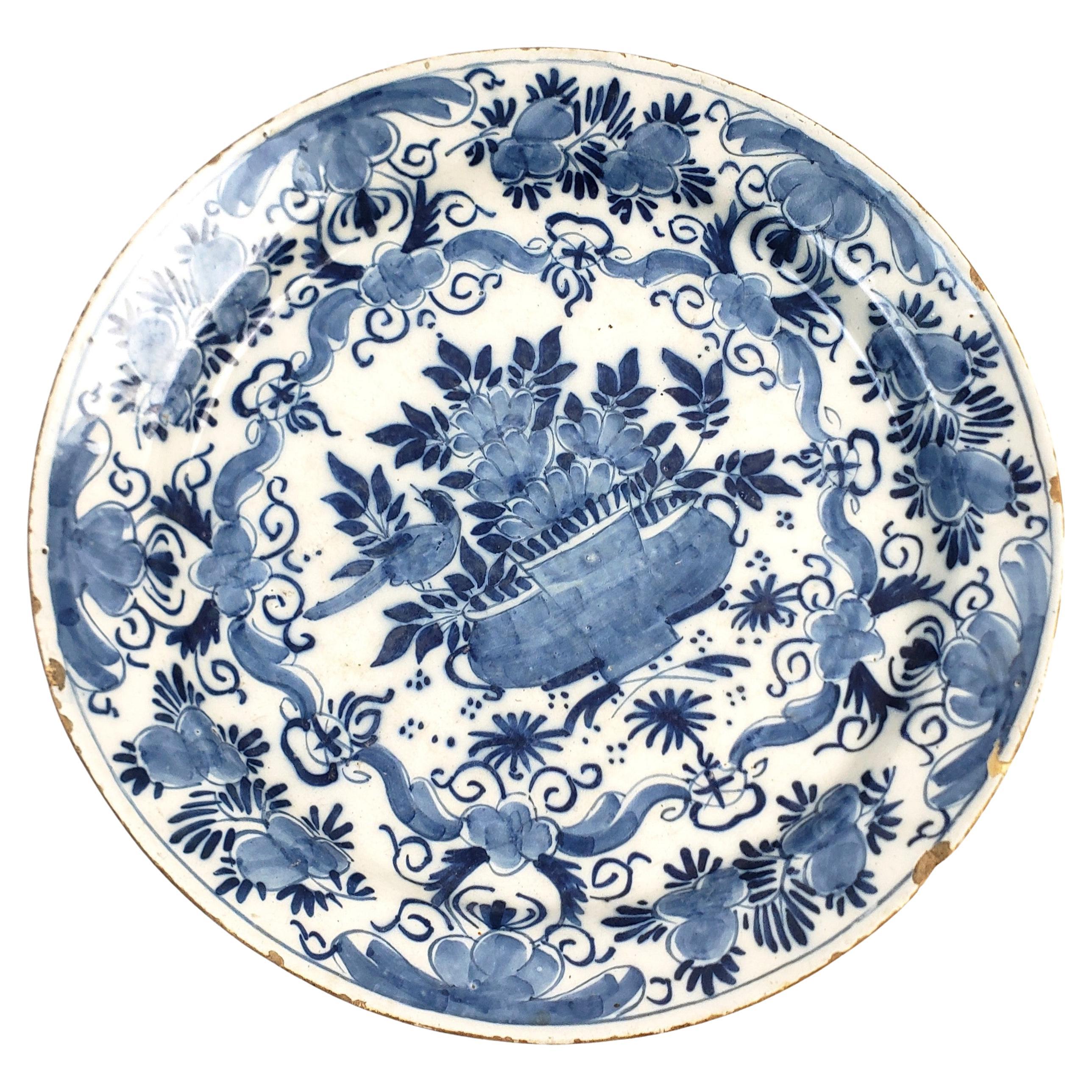 Antique Early Delftware Charger with Stylized Floral Decoration For Sale
