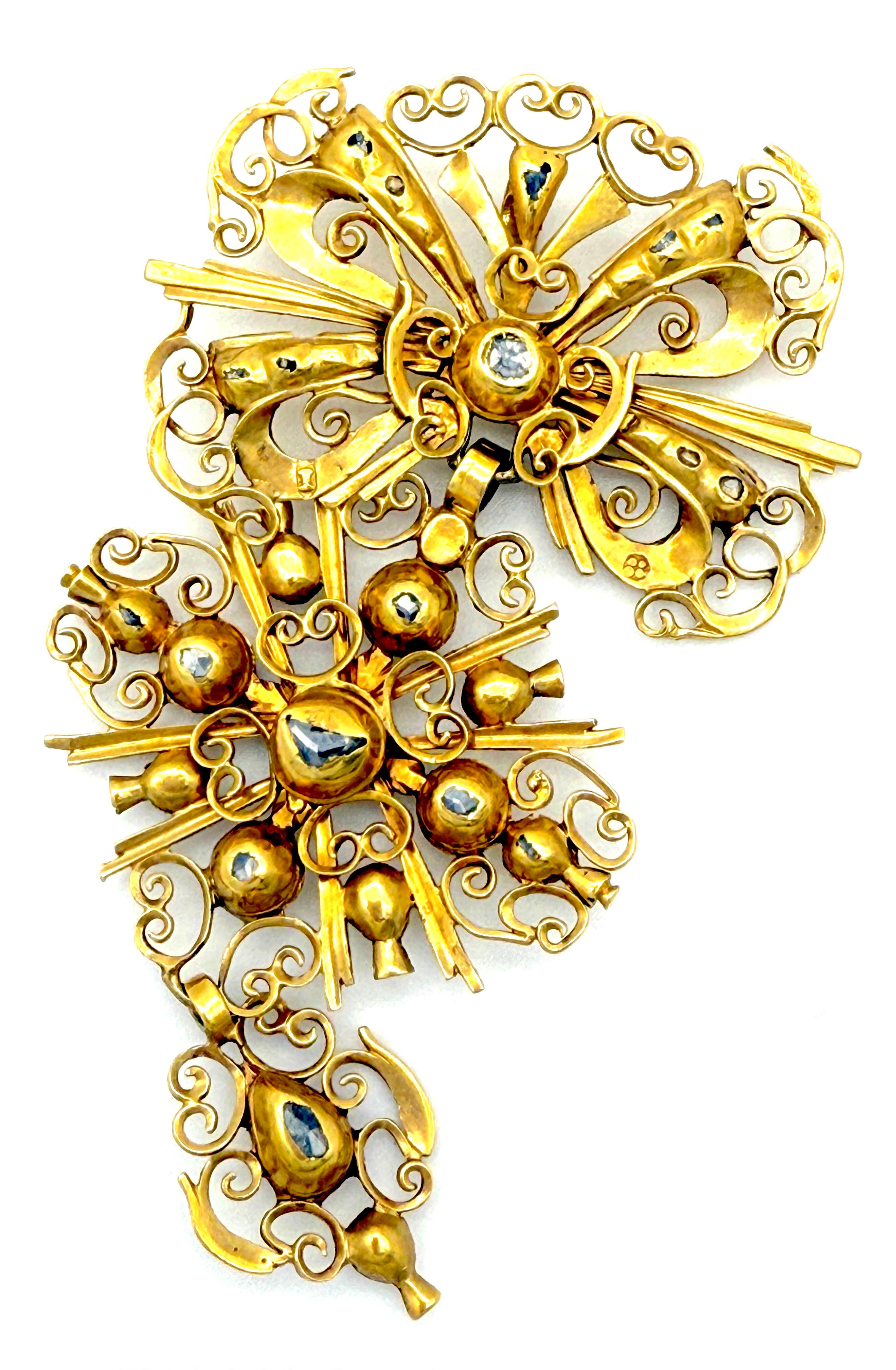 This rare gold slide pendant was created in the 1st half of the 18th century. The pendant is set with rose cut diamonds in closed back settings. This style of slide is typical for Baroque jewellery and was worn on a ribbon.
The pendant is made up
