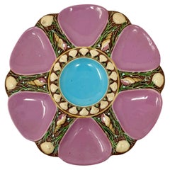 Ancienne assiette à huîtres rose en porcelaine majolique de Minton, vers 1875