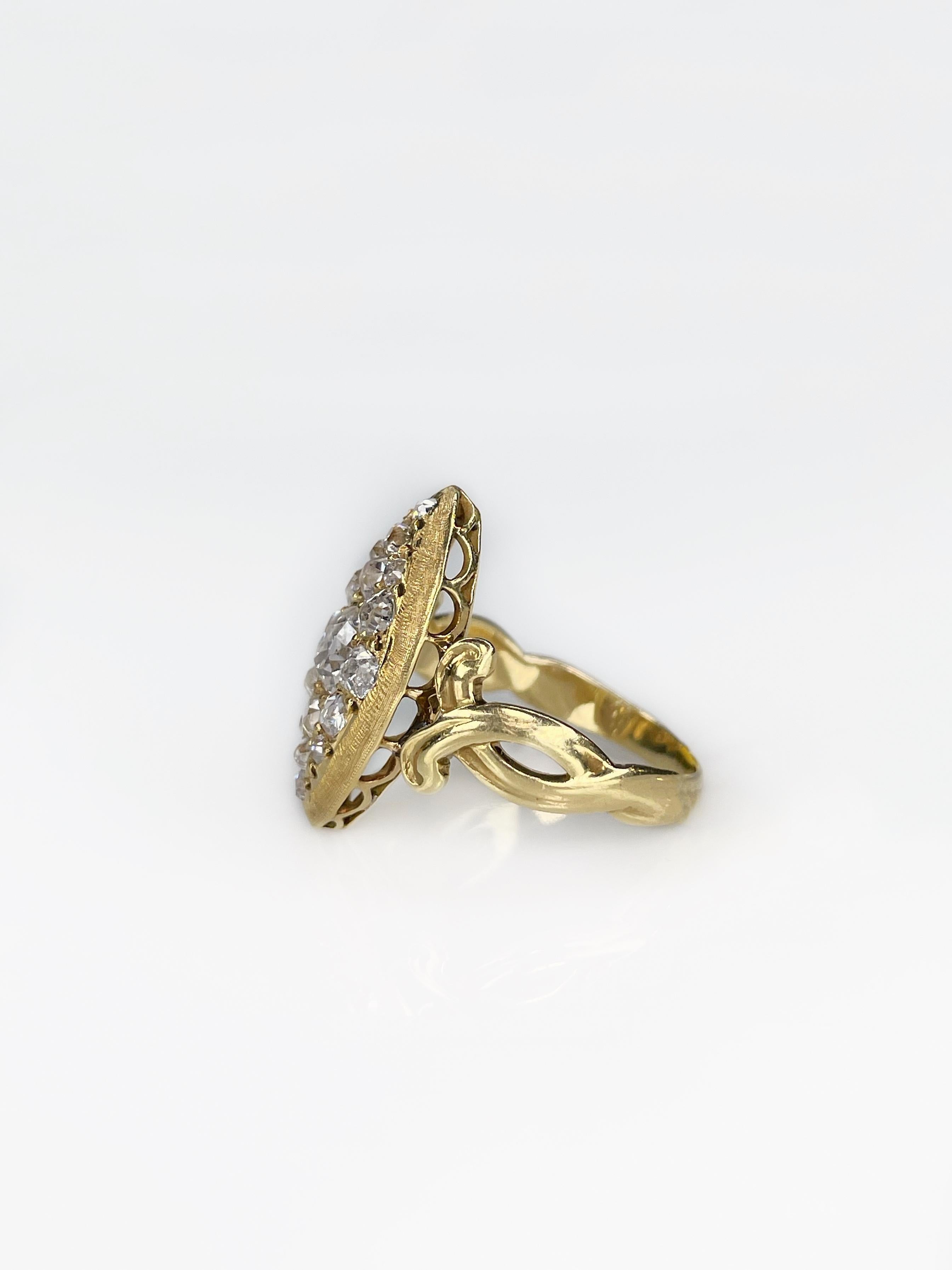 A delightful Early Victorian period navette ring in 18 karat yellow gold. It is composed of 17 old mine cut diamonds, which in total weight ~0,70ct. The colour of gems is RW-W and clarity – SI.

The edge of the head is delicately ornamented, and the
