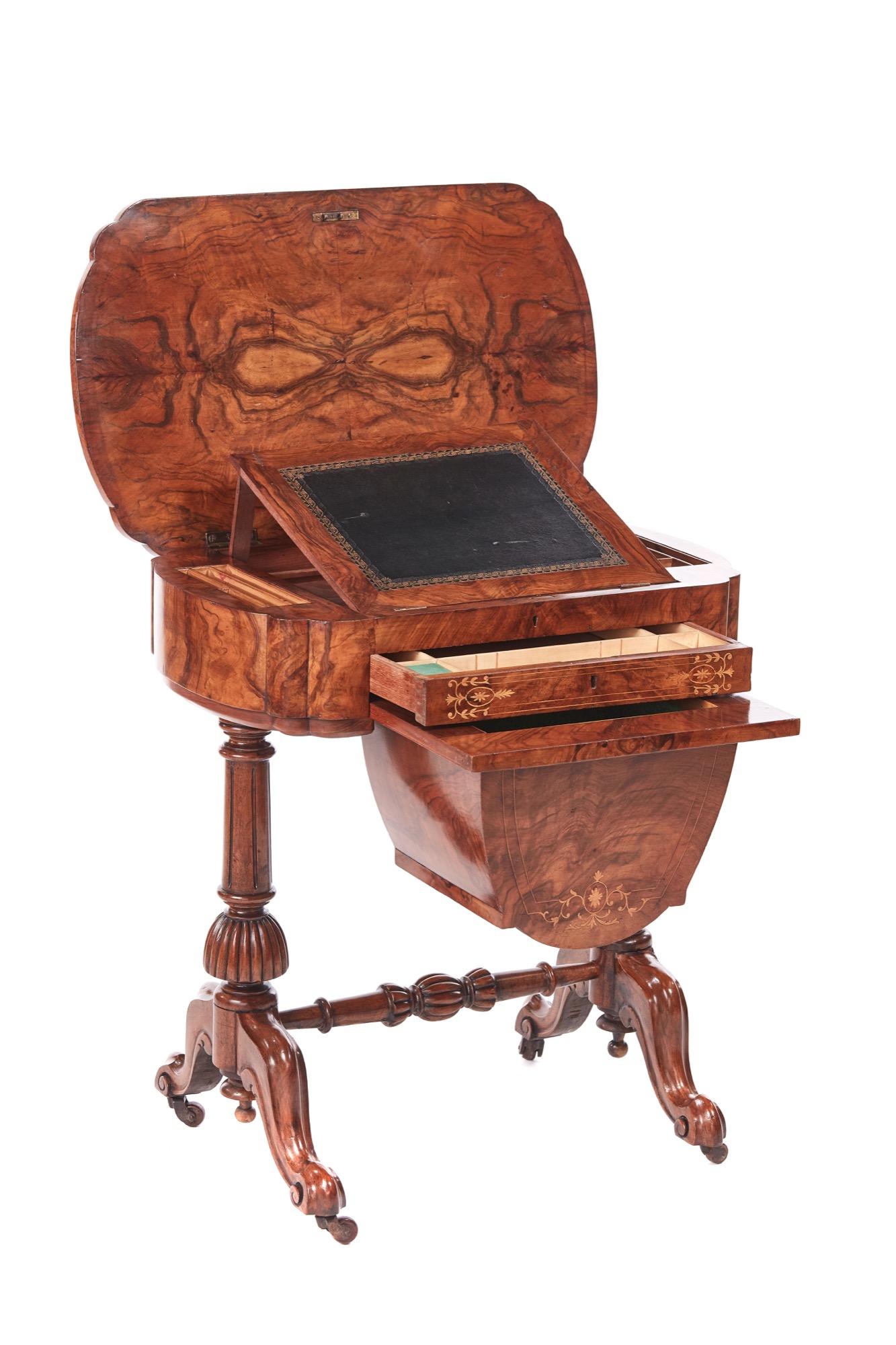 This antique early Victorian 19th century inlaid burr walnut writing or sewing table is an exquisite example having a superior quality burr walnut lift up top with beautiful satinwood inlay with a fitted writing slope inside, one frieze fitted