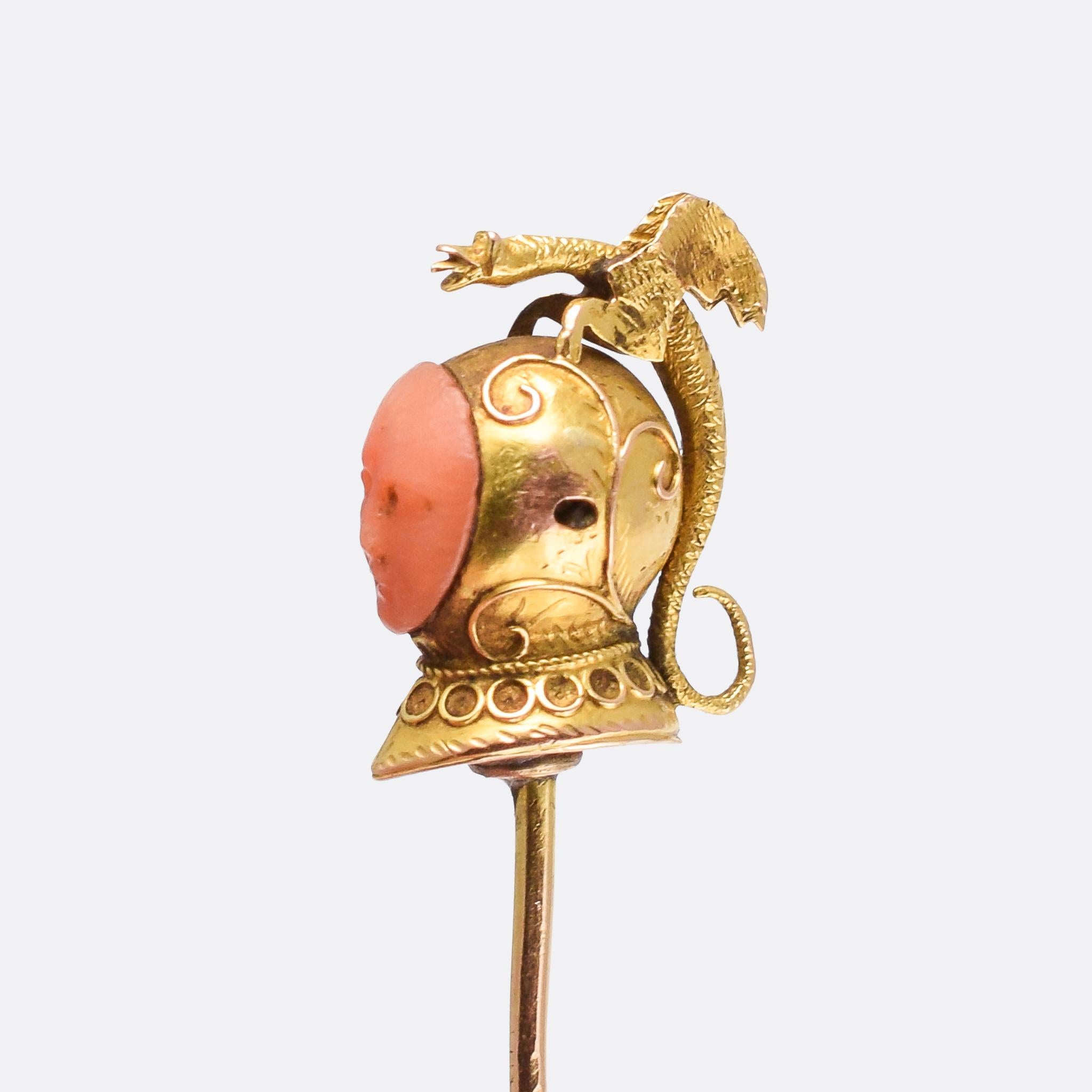 A remarkable antique stick pin modelled as a Knight’s Helm, complete with carved coral face and decorated with applied gold motifs. Oh, and did I mention the Dragon perched on top?  It dates from the early Victorian era, circa 1850, modelled in 15