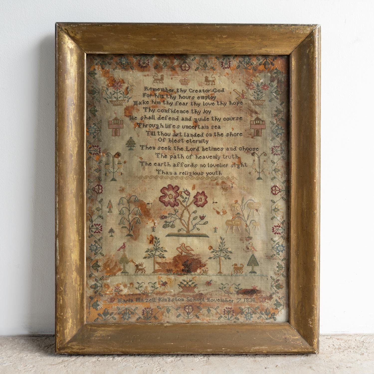ANTIQUE FRAMED SAMPLER

A charming and decorative sampler with a wealth of animals, buildings, plants and flowers depicted in a folky, naive style within a floral border.

The sampler is signed ‘Maria Hazell, Kingston School’. It is also dated