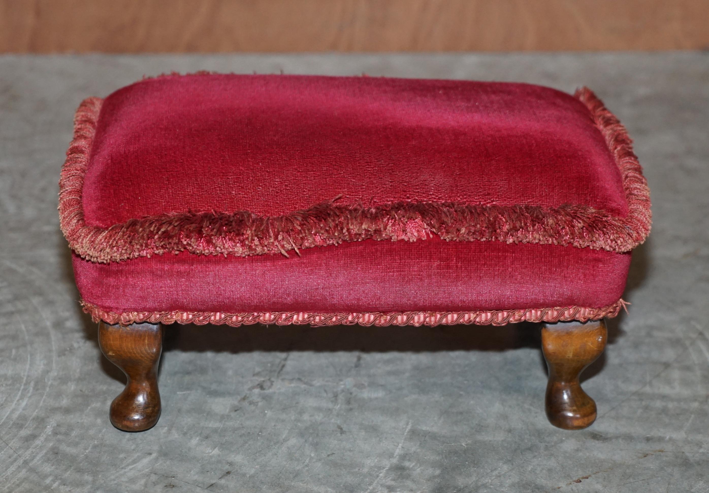 We are delighted to offer this very nice early Victorian footstool with lovely soft pink upholstery and cabriolet mahogany legs

A good looking and well made piece. These types of stools were designed to be used with wingback armchairs, the idea