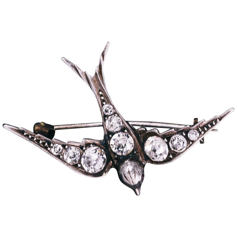 An antique swallow brooch