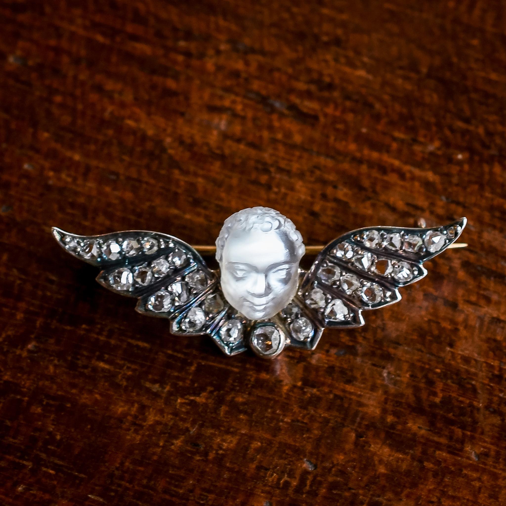 Antique Early Victorian Winged Man-in-the-Moonstone Brooch In Good Condition For Sale In Sale, Cheshire