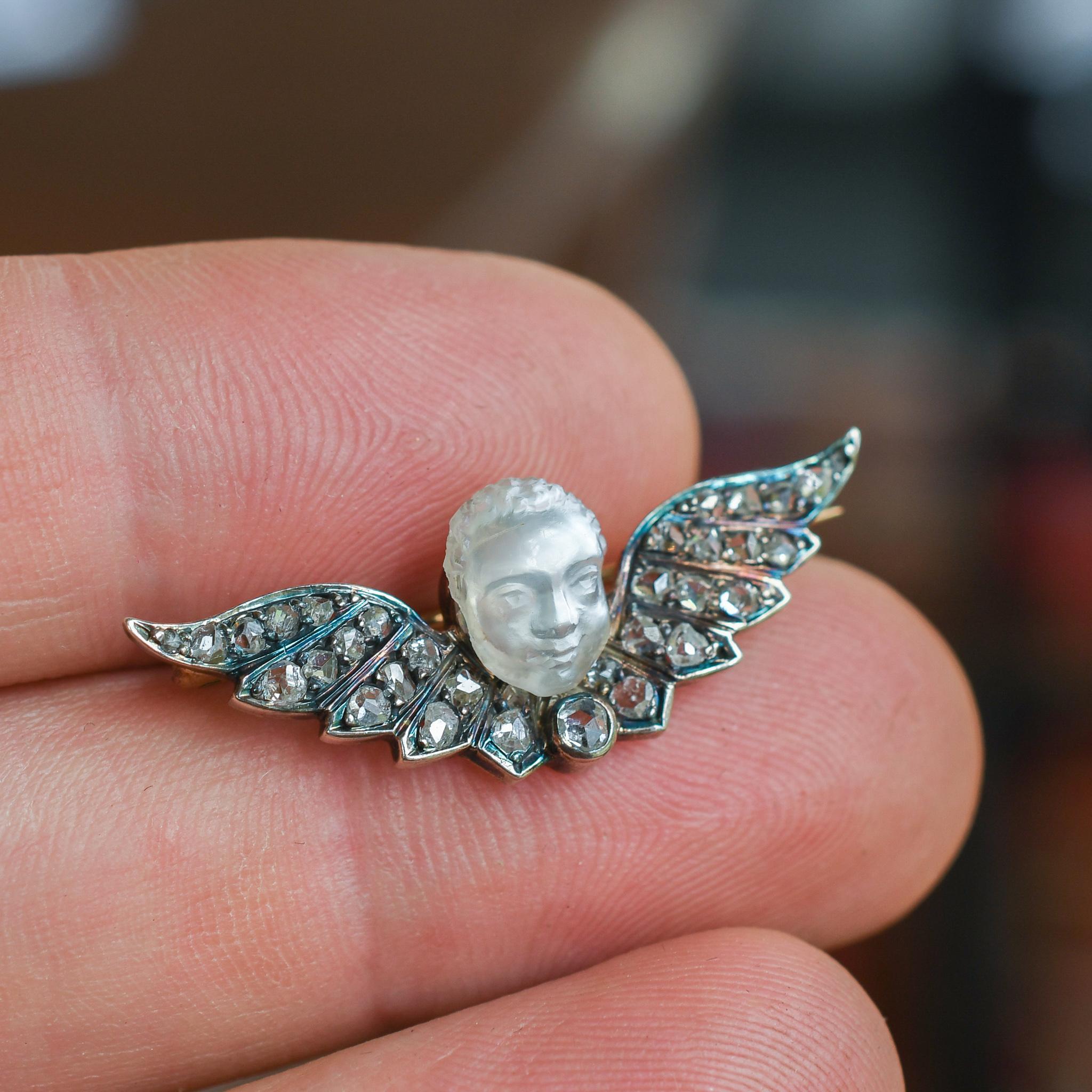 Women's or Men's Antique Early Victorian Winged Man-in-the-Moonstone Brooch For Sale