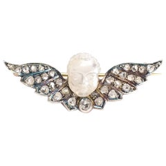 Antique Early Victorian Winged Man-in-the-Moonstone Brooch