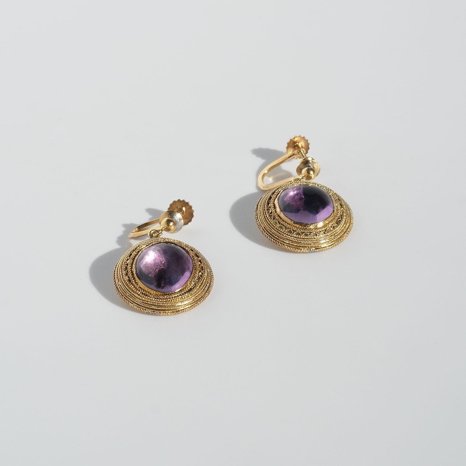 Cabochon Antique earrings. Gilded silver and amethysts. For Sale