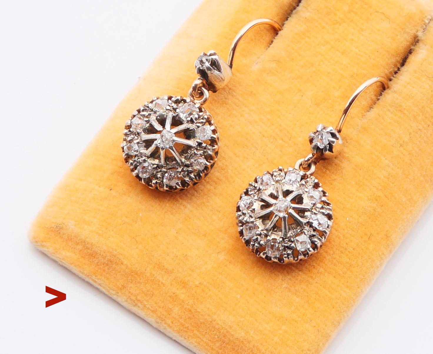 A pair of old European Diamond Earrings dating from ca 1920s - 1930s.

No hallmarks. Wires Metal tested 14K Gold, clusters in White Gold or Silver. 

Each earring is 30 mm long including the hooks. Each openwork floret Ø 13 mm 

All twenty Diamonds