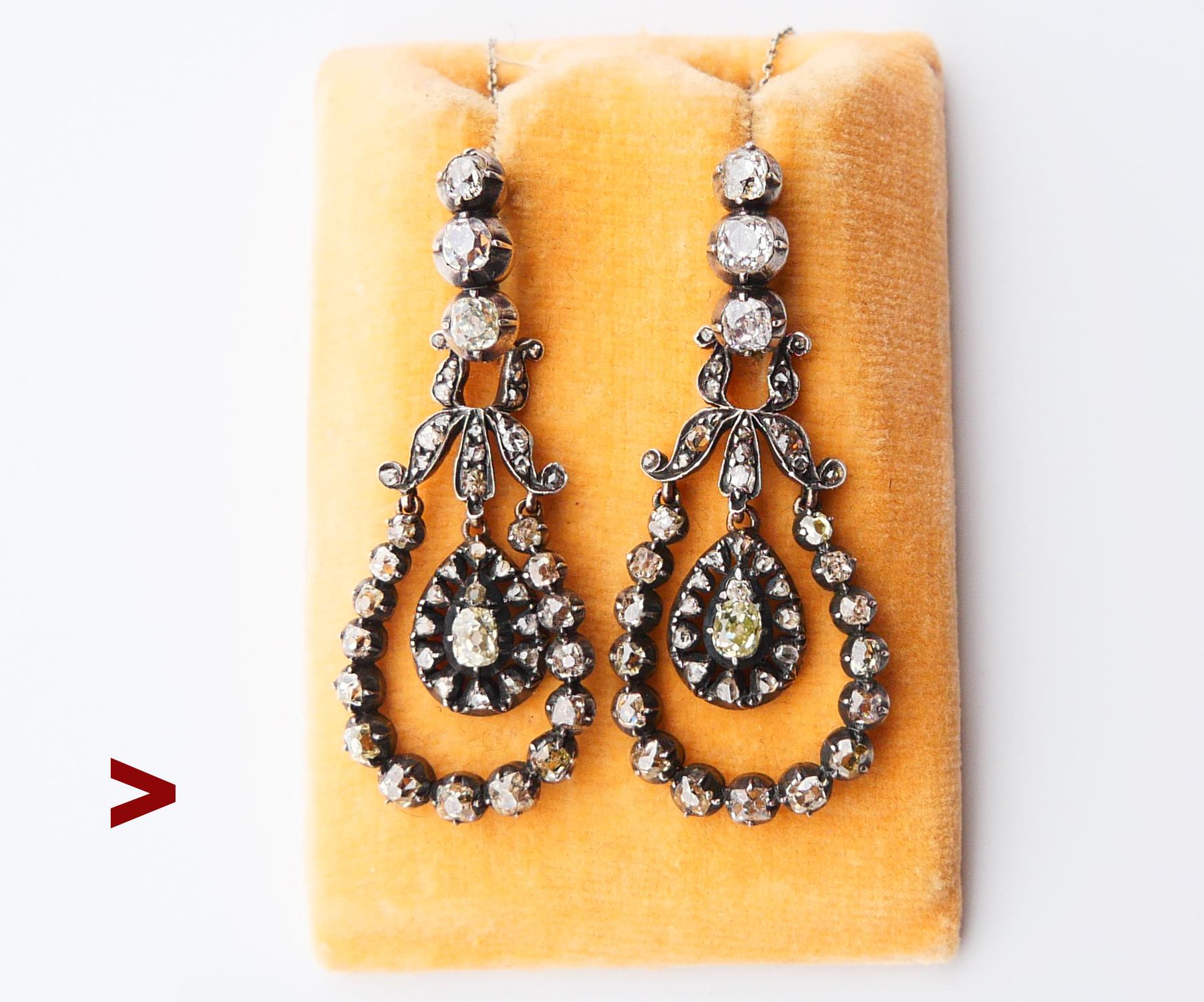 Old European Diamond Earrings with Silver over 18K Gold designed and hand - crafted ca. late 18th - early 19th century and modified in 1939 at famous Swedish workshop of W.A.Bolin. 

Each earring measures 43 mm long from the very top ( without