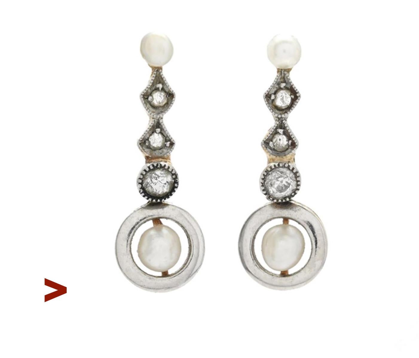 A pair of antique European stud Earrings hand - made ca .1930s  in 18K Yellow /White Gold (tested)  with flexible pendants featuring natural Oriental pearls and Diamonds.

Total length is 18 mm. Pearls : larger half- pearls: Ø 3.25mm , small Ø 