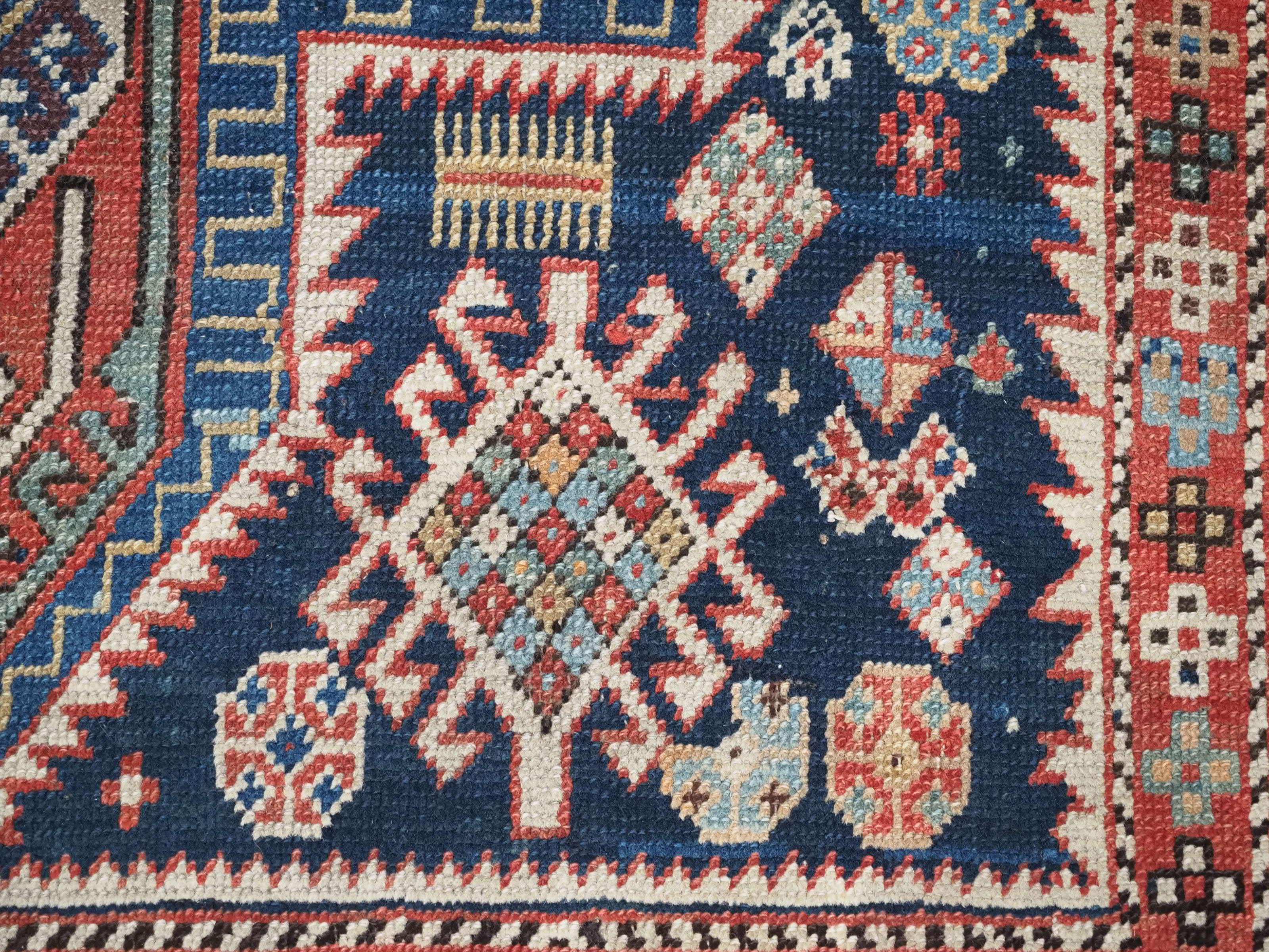 Antique East Caucasian Akstafa rug with twin medallions.  Circa 1890. For Sale 7