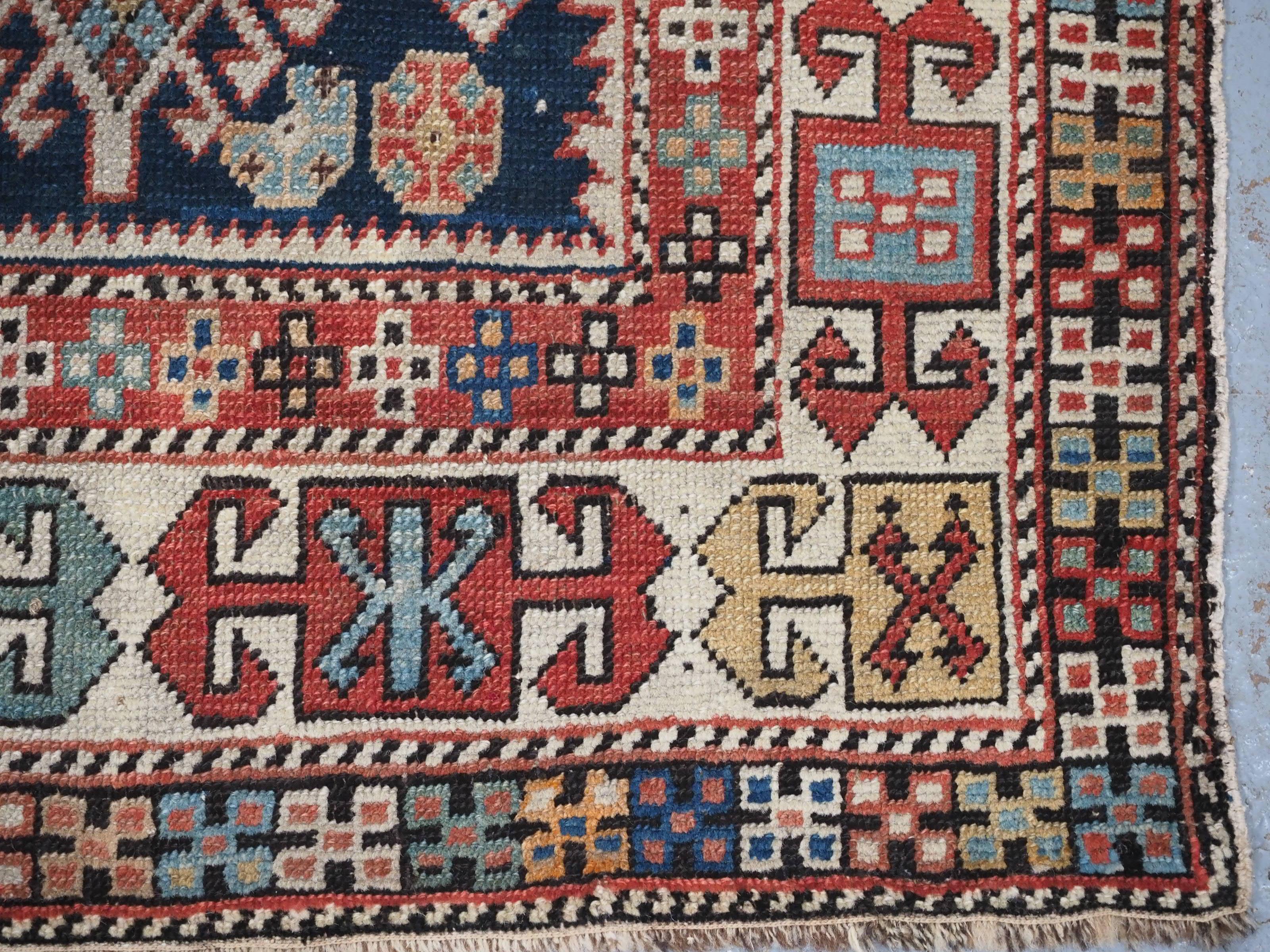 Antique East Caucasian Akstafa rug with twin medallions.  Circa 1890. For Sale 8